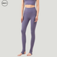 Model wearing Amethyst Breathable Stirrup Yoga Leggings by SWEATY, designed for ultimate comfort and flexibility. The leggings feature a high-waisted design and stirrup straps for secure fit during yoga and other fitness activities. The amethyst color highlights style while maintaining functionality.