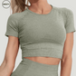 Army Green Seamless Quick Dry Yoga Crop Top by SWEATY - Women's breathable, moisture-wicking, and stretchable crop top ideal for yoga, gym workouts, and fitness activities. Made with high-performance fabric for ultimate comfort and style.