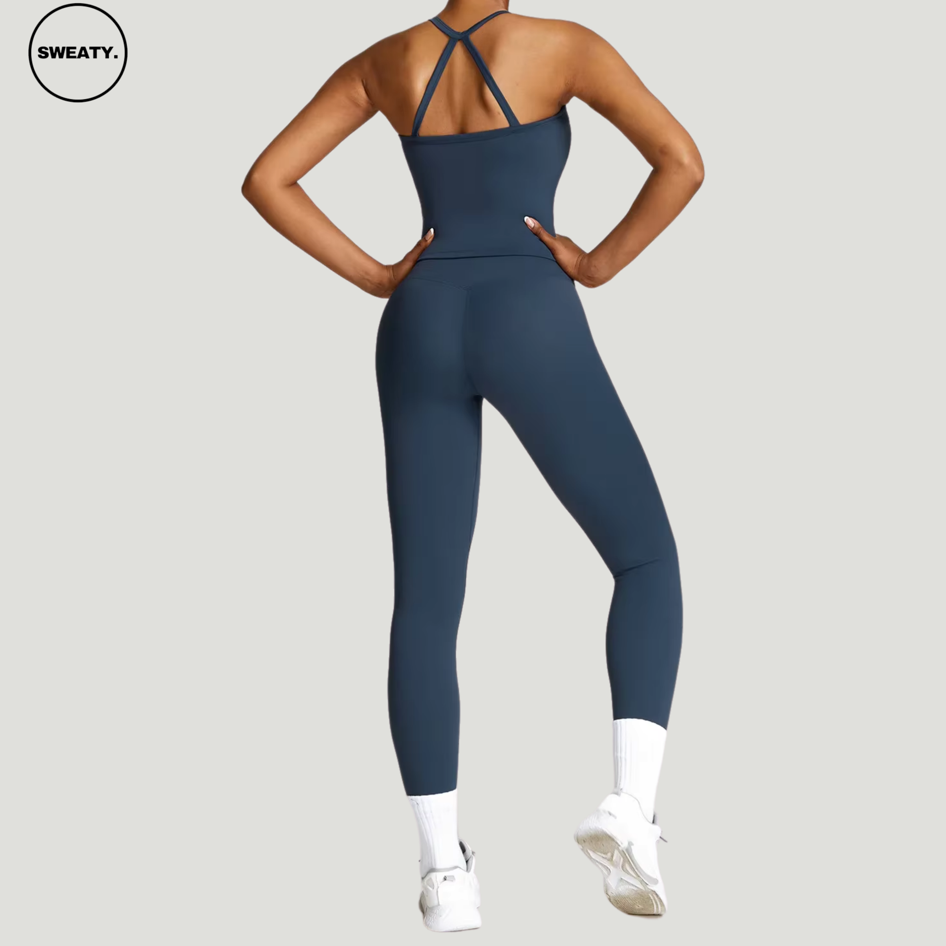 Badge blue seamless yoga set by SWEATY - Women's back view showcasing the comfortable and flexible design. Perfect for yoga, running, and fitness activities. SWEATY activewear with moisture-wicking fabric for optimal performance.