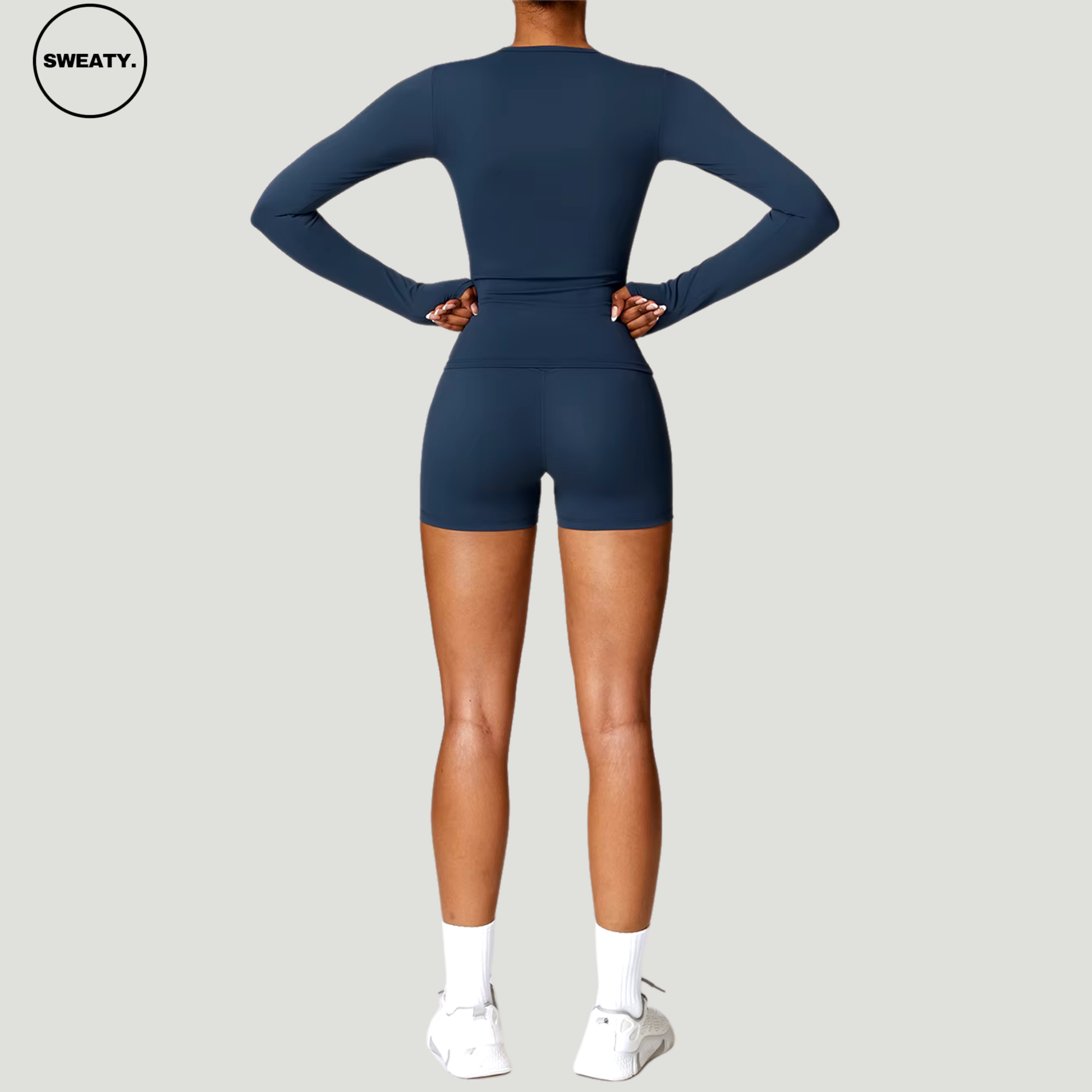 Badge blue seamless yoga set with long sleeves by SWEATY - Women's full back view showcasing the flexible and supportive design for yoga, fitness, and activewear. Lightweight and quick-drying SWEATY activewear for superior performance.