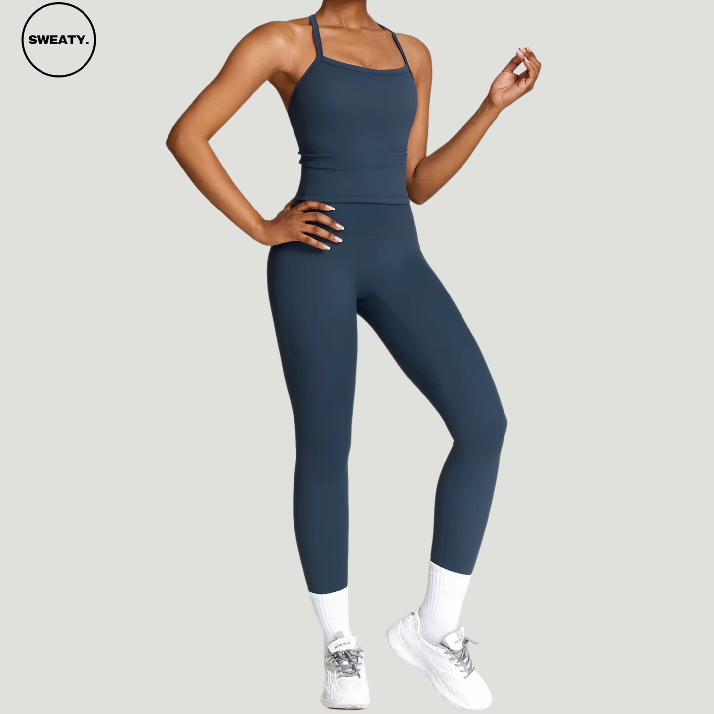 Badge blue seamless yoga set by SWEATY - Women's side pose view showing the sleek and flexible design, ideal for yoga, gym, and fitness. SWEATY activewear with breathable, moisture-wicking fabric for optimal comfort during workouts.