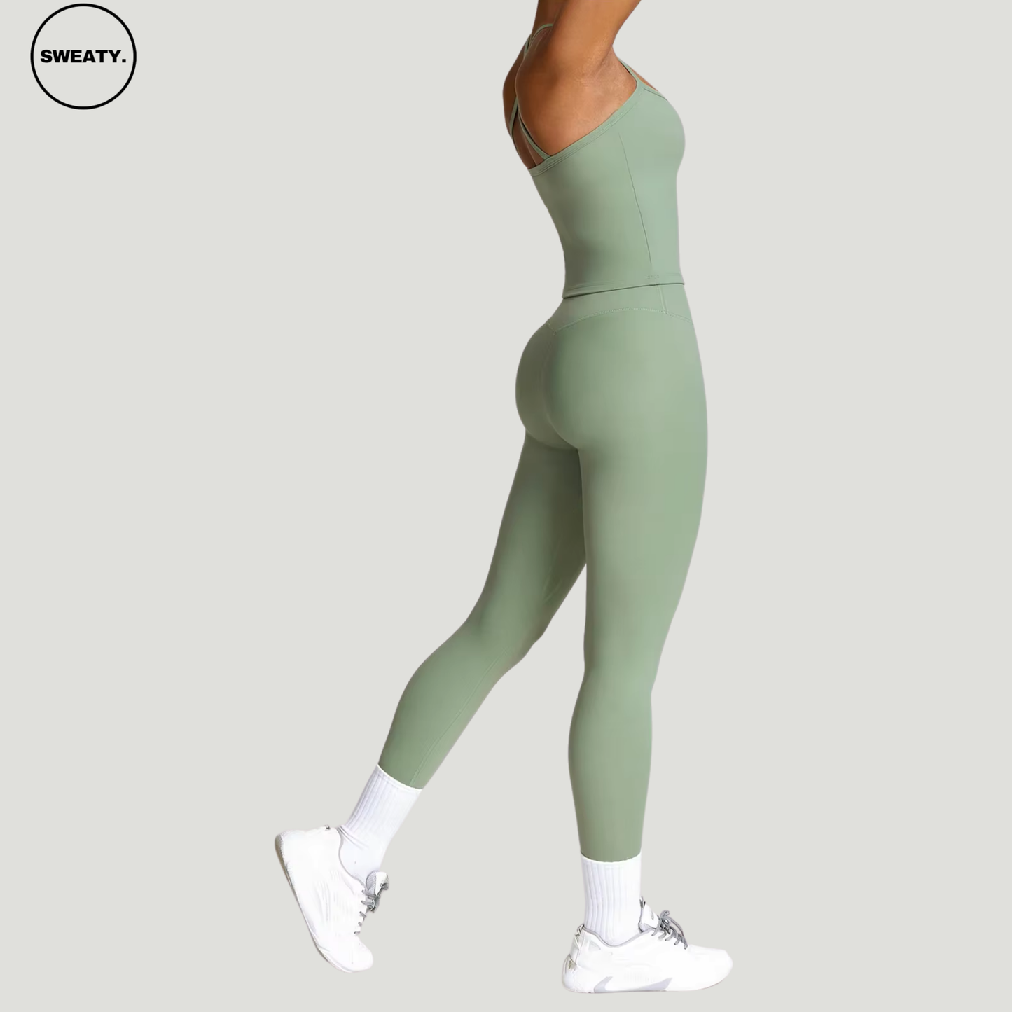 Basil green seamless yoga set by SWEATY - Women's side pose view featuring a flexible and sleek design, perfect for yoga and activewear. SWEATY activewear made from breathable, quick-drying fabric for optimal performance.