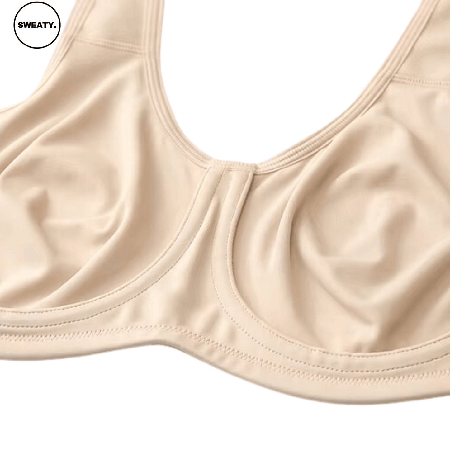 Beige Sports Bra by SWEATY - Close-up of the cup design, showcasing seamless and supportive construction. SWEATY activewear offers superior comfort and fit for high-impact workouts.