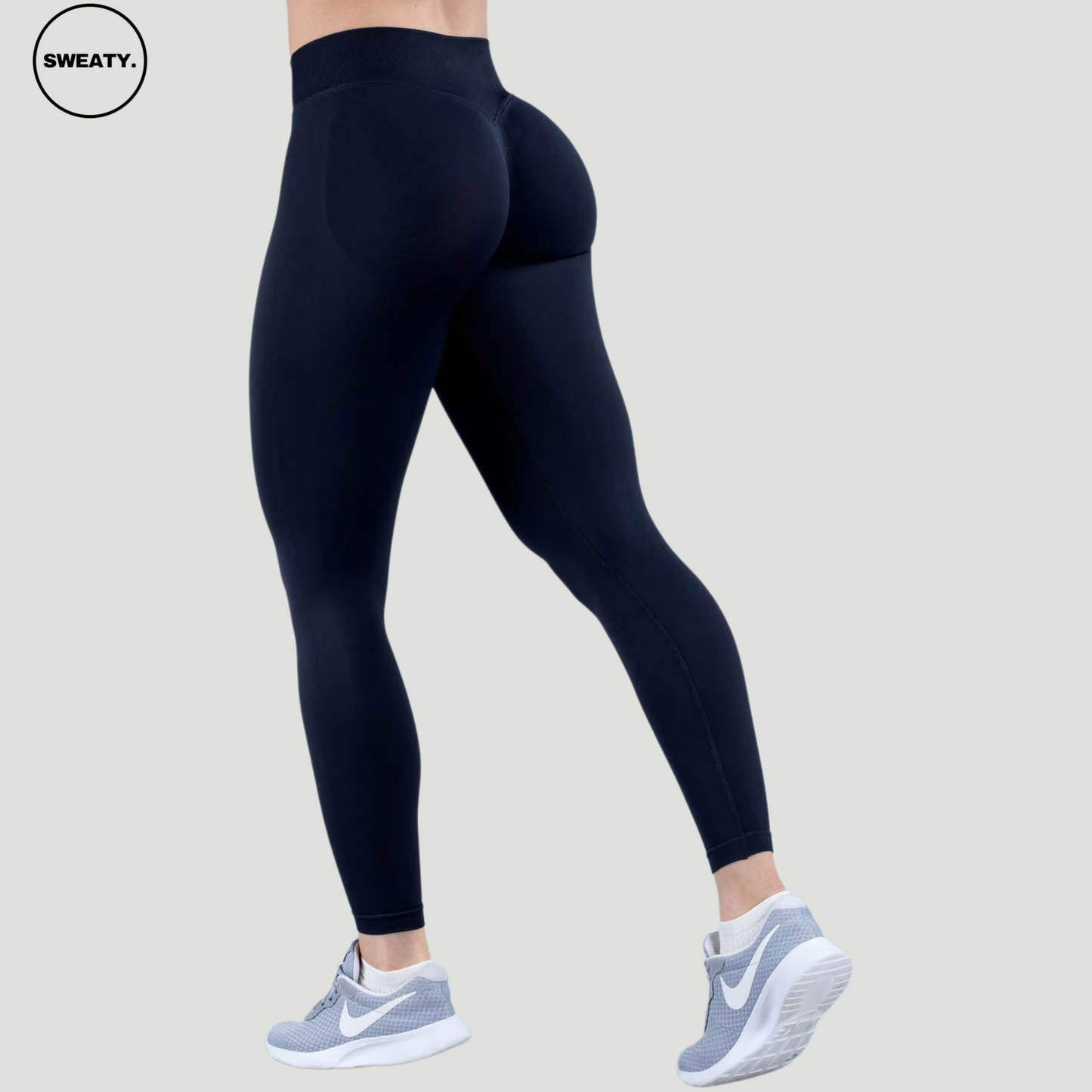 SWEATY Black High Waist Scrunch Butt Yoga Leggings, back angle view highlighting the scrunch butt design for a flattering, form-fitting silhouette that accentuates the curves.