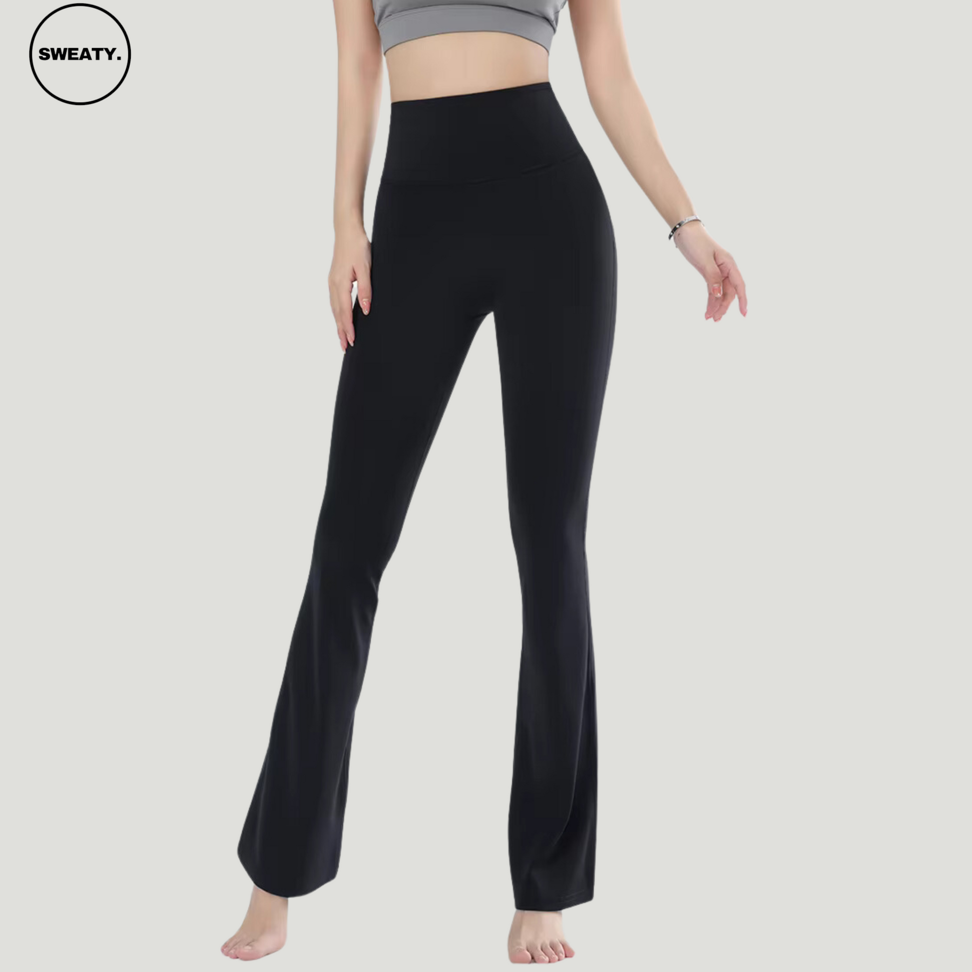 Black High Waist Slim Yoga Pants by SWEATY - Front view showcasing a sleek, high-waist design with a slim fit and flared legs. Ideal for yoga, fitness, and casual wear. Made from breathable, stretchy fabric for comfort and mobility during workouts.