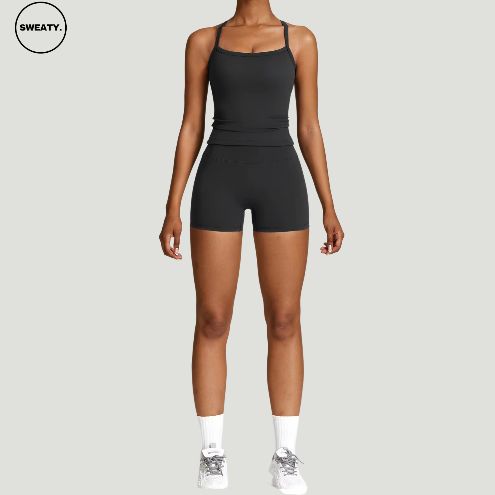 Black seamless yoga set by SWEATY - Women's comfortable and breathable workout set with moisture-wicking fabric. Designed for yoga, gym, and fitness activities. SWEATY activewear with quick-dry technology for optimal performance.