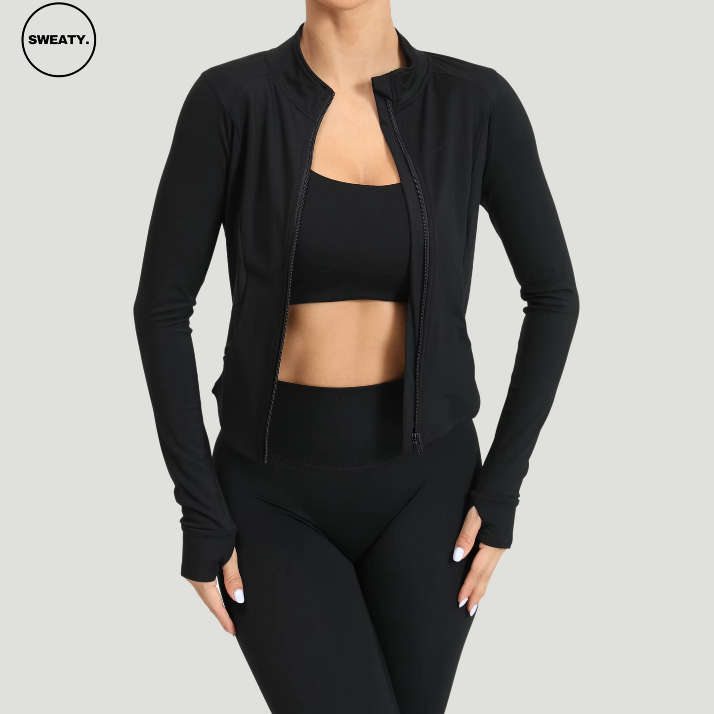 Black Three Piece Workout Set by SWEATY - Full front view of women's high-waisted leggings, sports bra, and zip-up jacket. Made with moisture-wicking fabric, ideal for yoga, gym, and fitness activities.