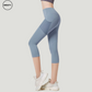 Blue High Waist Mesh Pocket Capri Pants by SWEATY, featuring mesh paneling and functional mesh pockets. These capri-length leggings offer a high-waisted design for a comfortable and supportive fit, perfect for yoga or athletic activities.