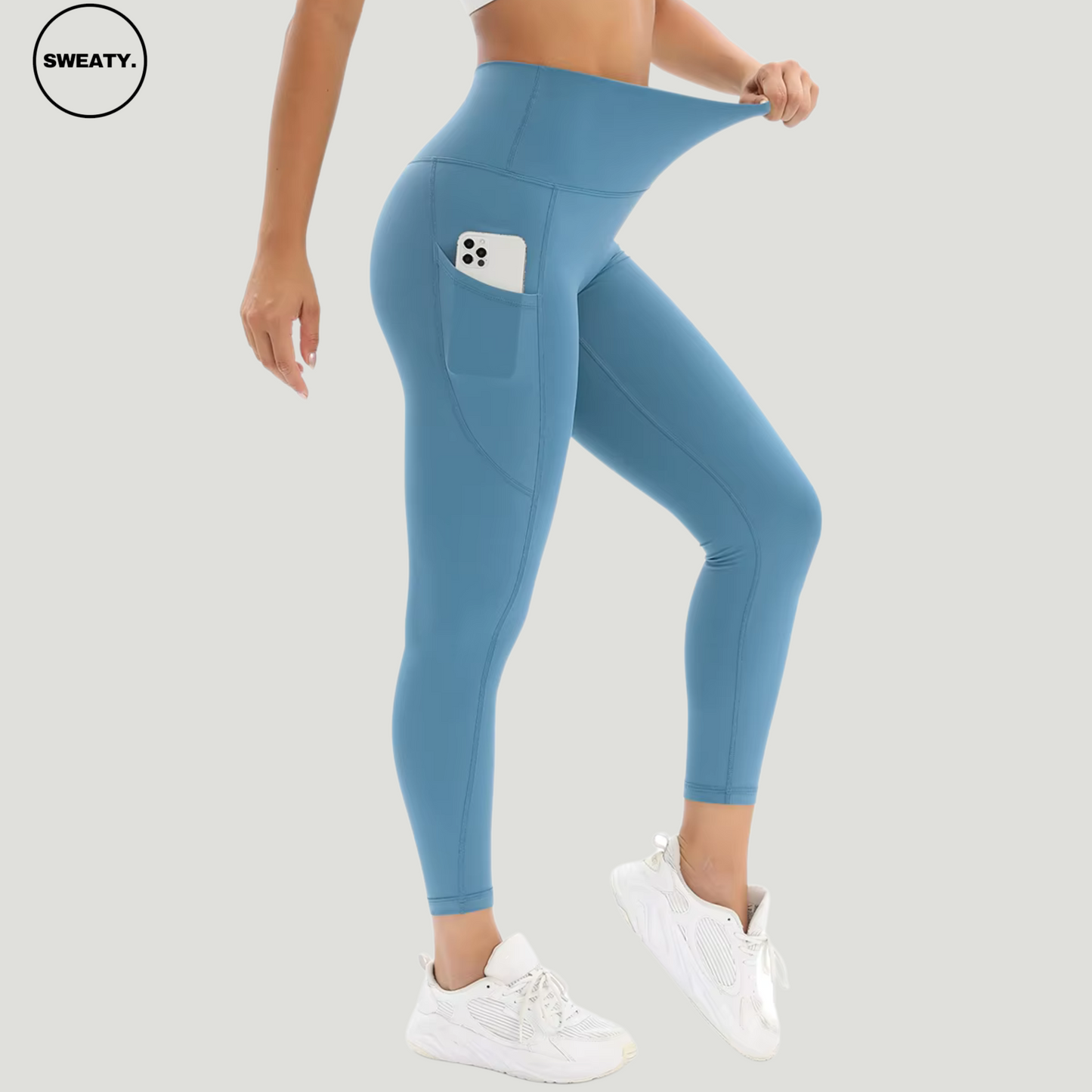 Blue Naked Feel Tummy Control Yoga Pants by SWEATY - Tummy control feature highlighted with side pocket and high-waist design. Stretchable and moisture-wicking fabric for yoga, gym, and daily activities. Comfortable and durable leggings with a sleek pocket for holding essentials like a smartphone.