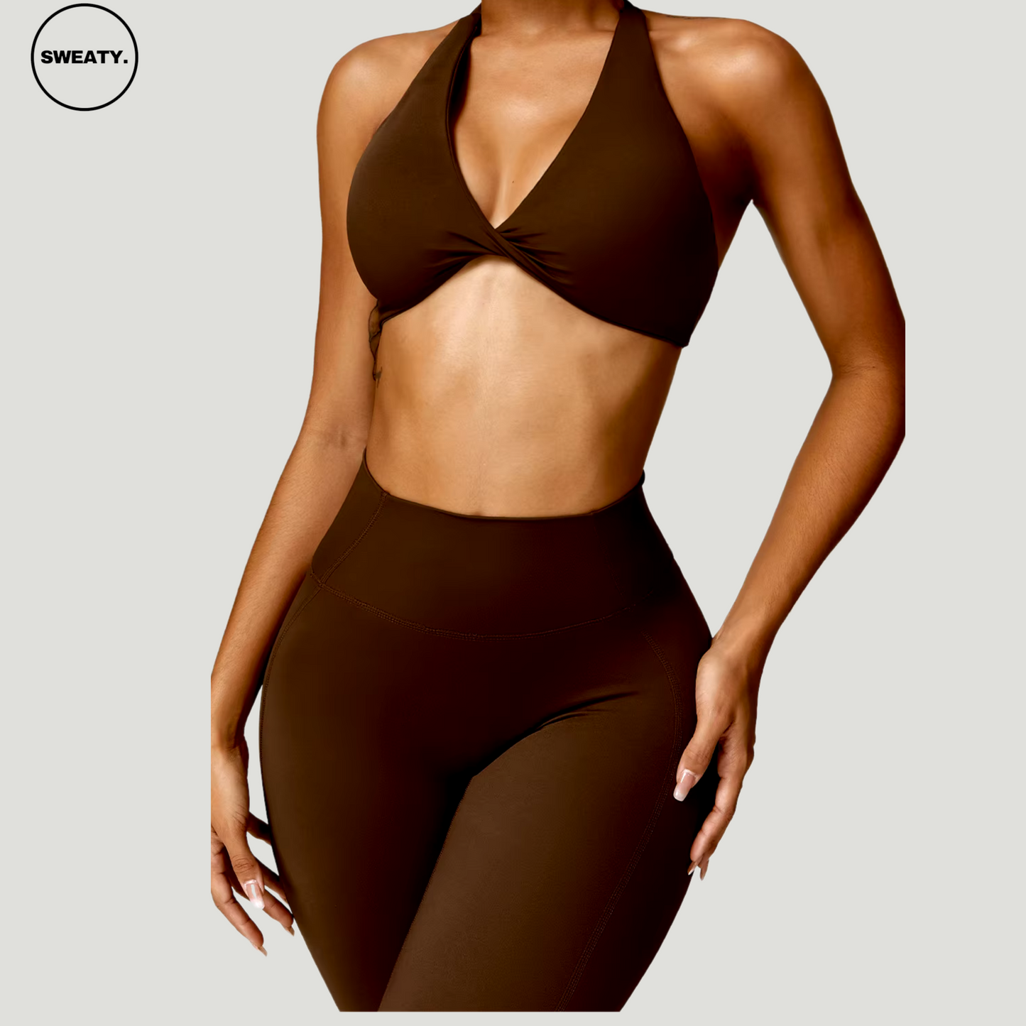 Brown Nude Feeling Yoga Set by SWEATY - Women's seamless, halter-neck, moisture-wicking sports bra and high-waisted leggings designed for yoga and fitness. Lightweight, breathable, and soft fabric for ultimate comfort during workouts