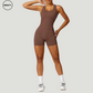 Brown seamless gym shortie jumpsuit by SWEATY - Women's full-body view showcasing a sleek, figure-hugging design. Perfect for gym workouts, this jumpsuit offers a seamless, breathable, and flexible fit for optimal performance and style.