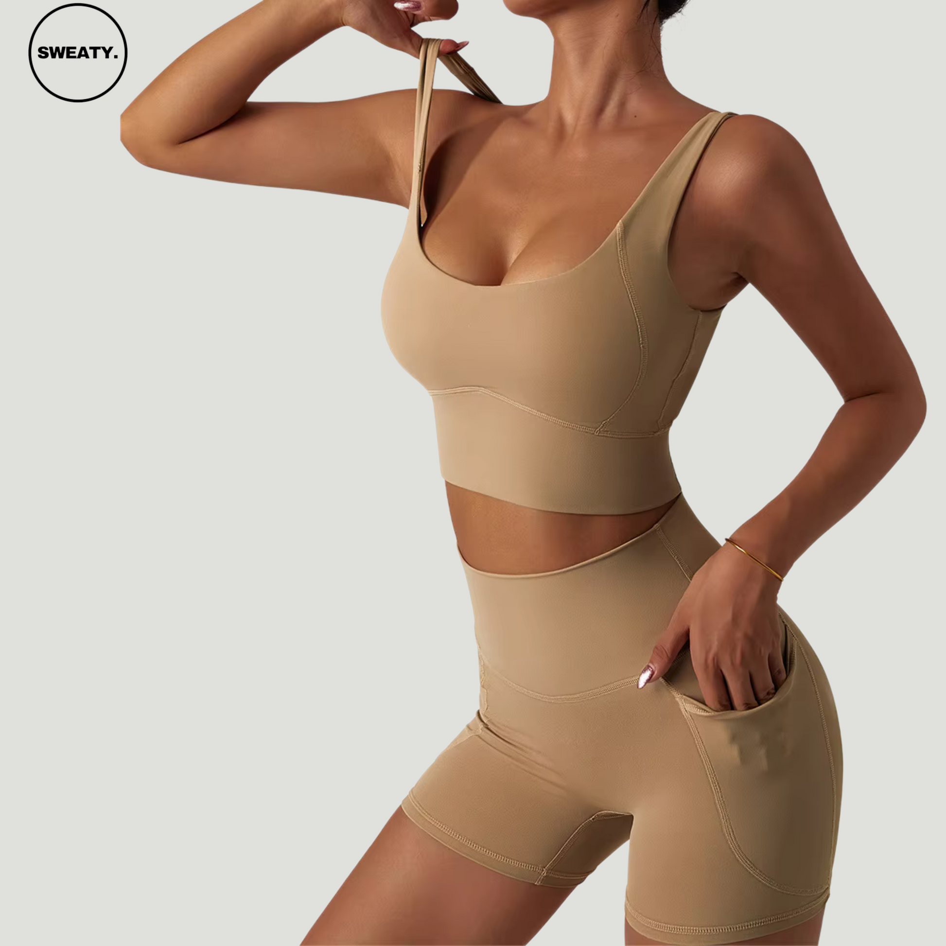 Brown seamless shorts set by SWEATY, showing a side view with pocket design and moisture-wicking fabric for optimal comfort during fitness, yoga, and running sessions.