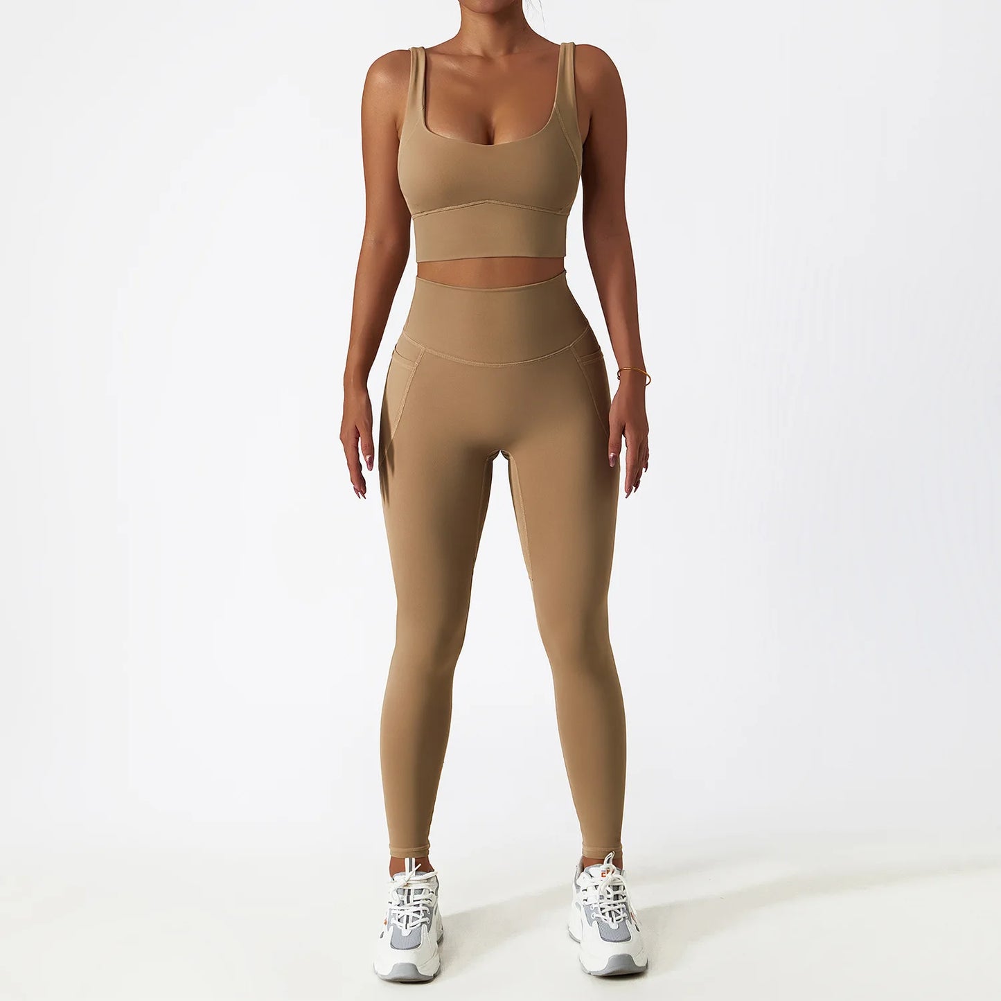 Camel seamless tracksuit set by SWEATY - Women's high-waisted leggings and matching sports bra, featuring breathable and moisture-wicking fabric. Ideal for yoga, fitness, and running, providing flexibility and all-day comfort during workouts.