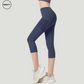 SWEATY Dark Blue High Waist Capri Pants with Mesh Pockets. These form-fitting capri-length yoga pants feature a high-waisted design with breathable mesh inserts for added ventilation, perfect for workouts and fitness activities.