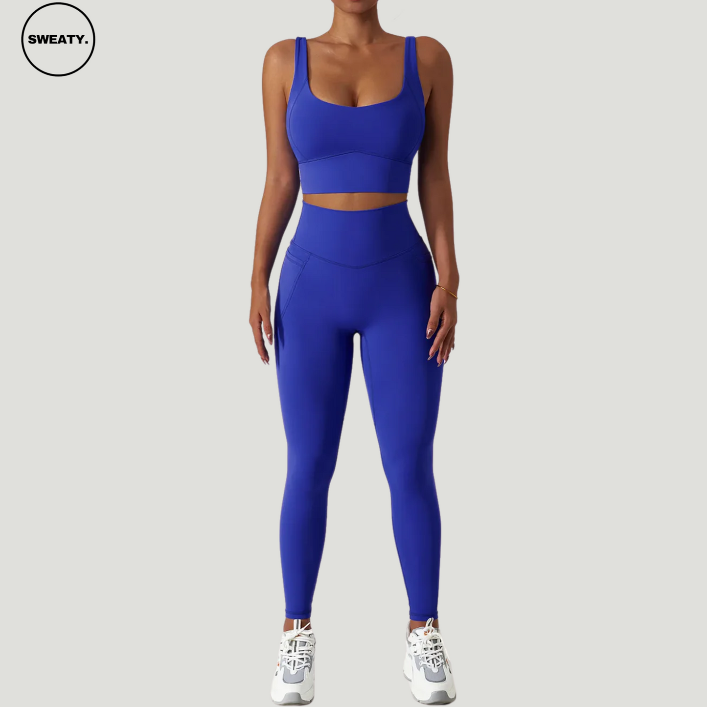 Dark blue seamless trousers set by SWEATY. Designed for comfort and flexibility with moisture-wicking fabric, ideal for fitness, yoga, and running. Perfectly suited for active lifestyles.