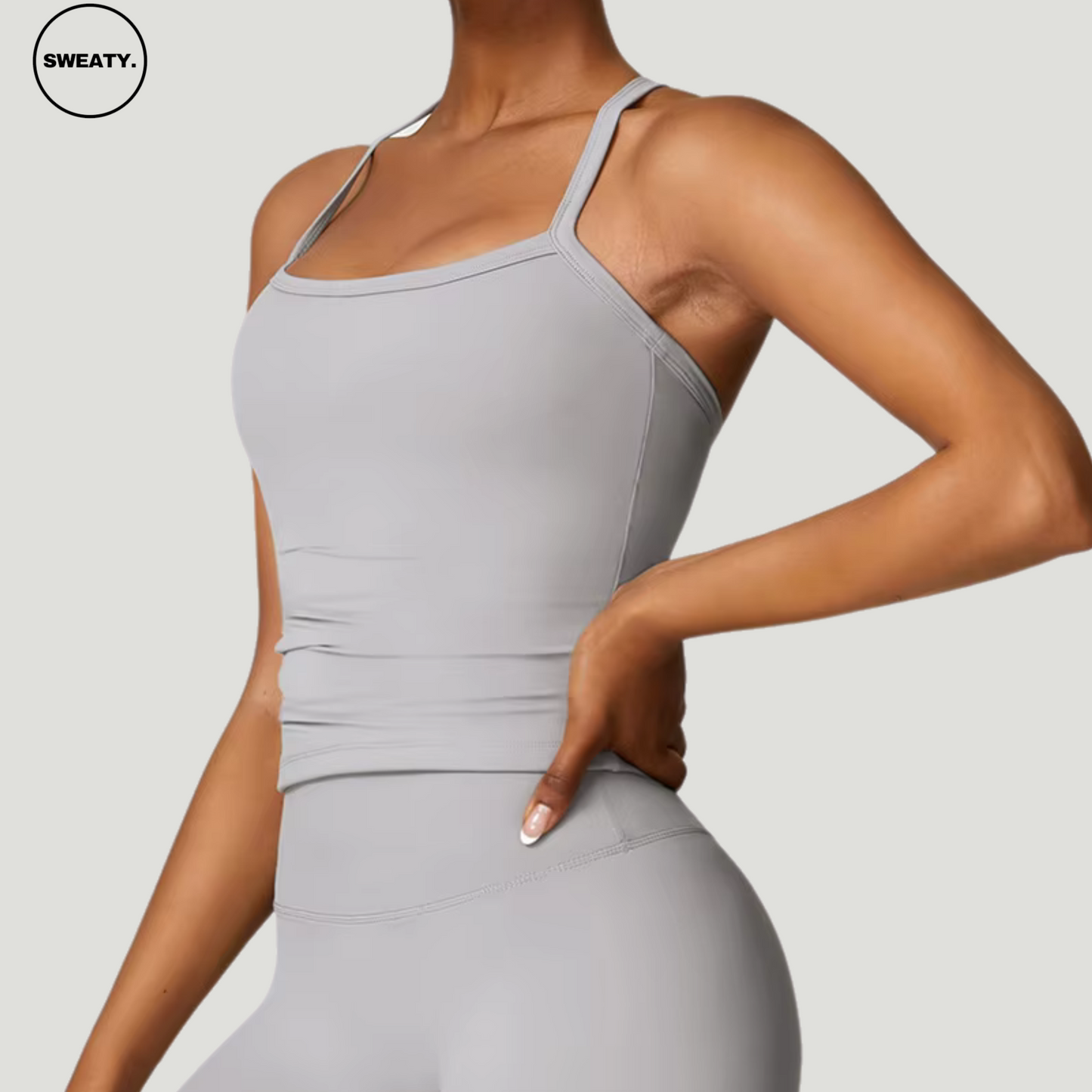 Side view of Frost Grey Push-Up Gym Bra Top by SWEATY - Women's gym bra with a supportive fit, designed with moisture-wicking fabric. Perfect for fitness activities like yoga, running, and gym workouts, providing both style and performance.