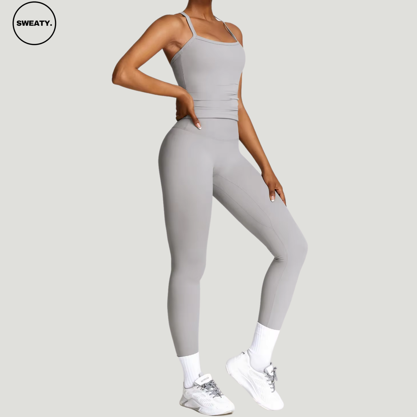 Frost Grey Seamless Yoga Set by SWEATY - Women's seamless activewear featuring a supportive tank top and high-waisted leggings, designed for yoga, fitness, and everyday activities. Made with moisture-wicking, breathable fabric for optimal comfort and performance.