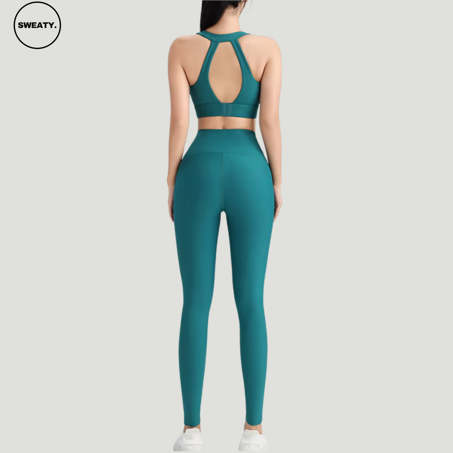 Green-Cross-Yoga-Suit-Back-View-by-SWEATY - Women's bold and vibrant Green Yoga Suit, featuring an elegant cross-back design for enhanced support and style during fitness activities. Perfect for those looking to stand out in the gym with both color and performance.