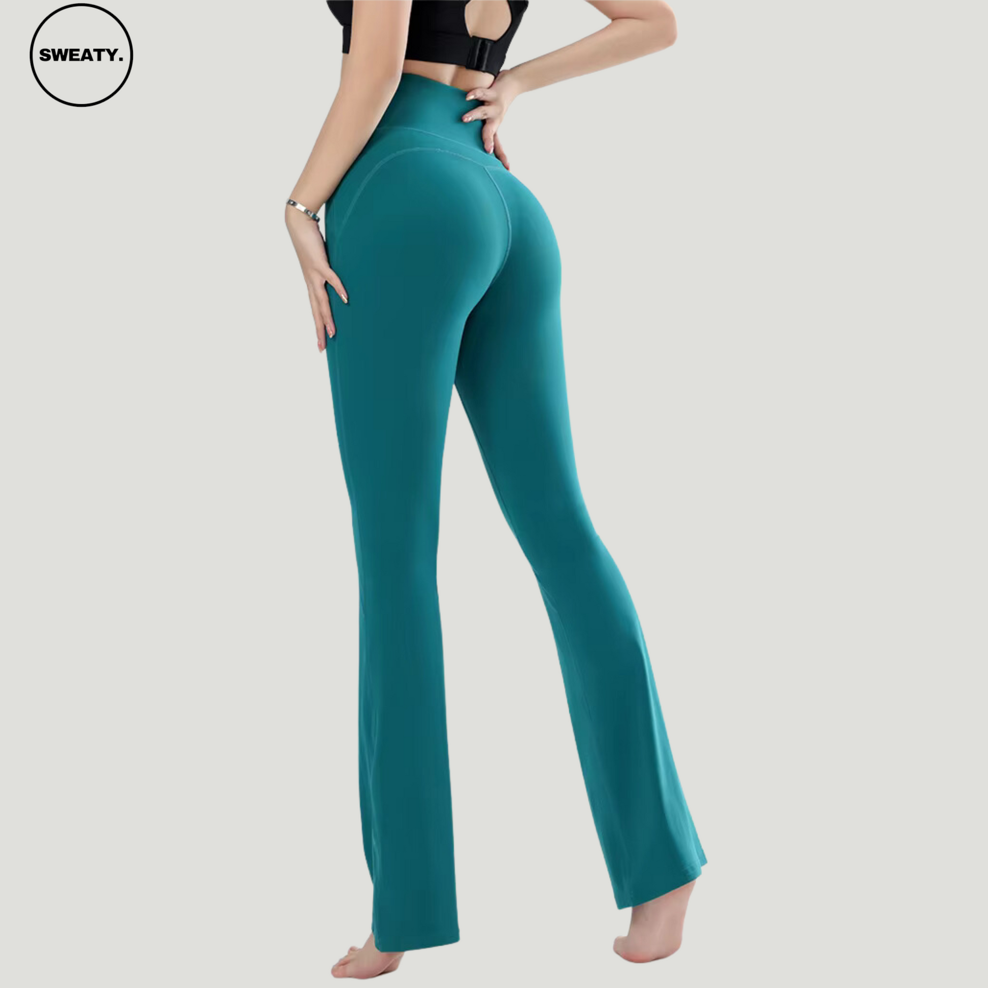 Green High Waist Slim Yoga Pants by SWEATY - Back view highlighting the high-rise waistband and flared leg. Form-fitting design ideal for yoga, fitness, or casual wear. Sweat-wicking fabric ensures comfort and breathability during intense activities.