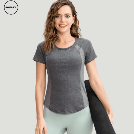 Grey Breathable Quick Dry Yoga Top by SWEATY - Women's lightweight, moisture-wicking, and breathable fabric designed for yoga, running, and fitness. SWEATY activewear top with quick-dry technology for optimal comfort and performance during workouts.