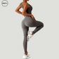 Back view of grey seamless tracksuit set by SWEATY - Women's moisture-wicking high-waist leggings and supportive sports bra, ideal for yoga, fitness, and running with breathable fabric for maximum comfort.