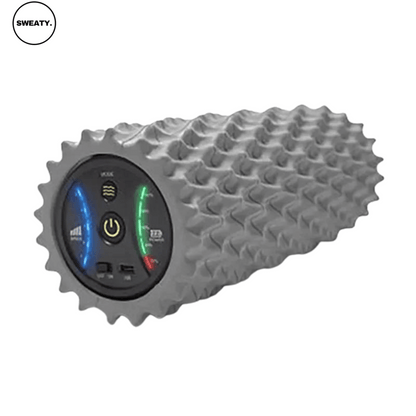 Close-up of a grey vibrating foam roller by SWEATY. Features textured surface and built-in controls for intensity adjustment. Ideal for muscle recovery, deep tissue massage, and relaxation after workouts. SWEATY fitness equipment for enhancing flexibility and reducing soreness.