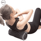 Side angle of a woman using a grey vibrating foam roller by SWEATY for back massage and muscle recovery. Features a textured surface and adjustable vibration settings, ideal for deep tissue massage, muscle relief, and post-workout recovery. SWEATY fitness equipment for enhanced flexibility and relaxation.