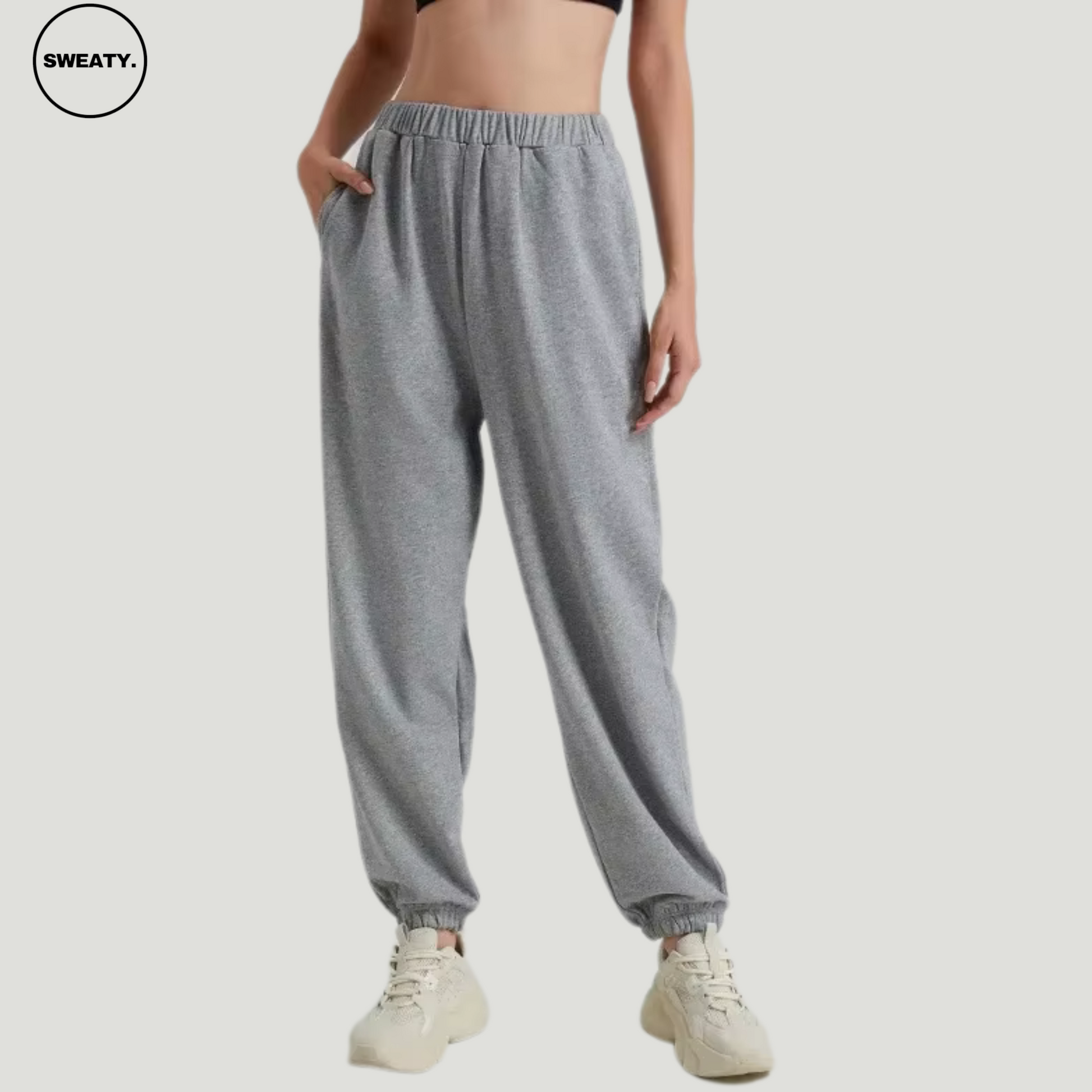 SWEATY Grey Wide Leg Fleece Lined Sweatpants, front view showcasing a loose fit, elastic waistband, and comfortable pockets, designed for warmth and ease.