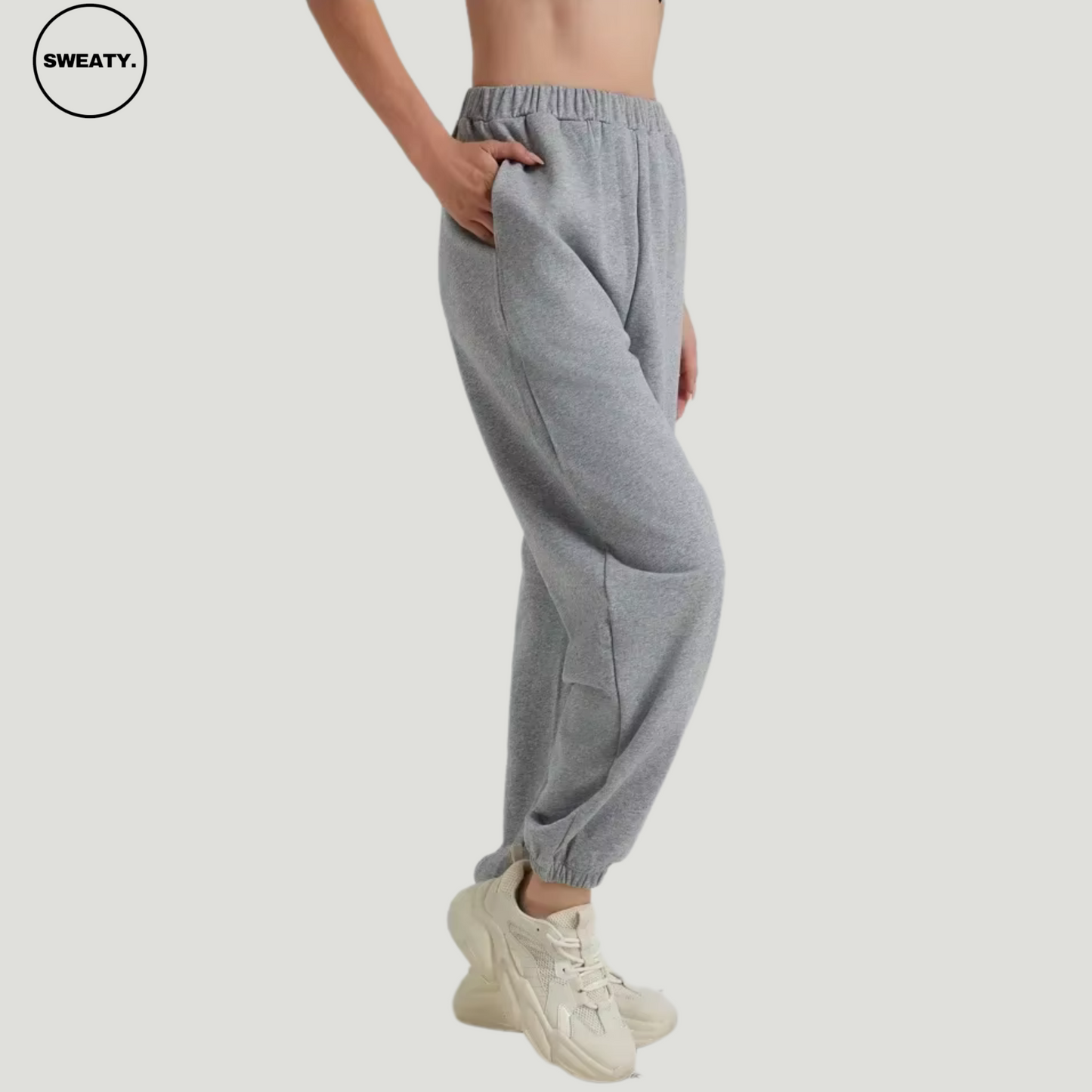 Grey wide-leg fleece-lined sweatpants by SWEATY - Cozy and comfortable women's sweatpants designed for lounging, fitness, or casual wear. SWEATY activewear with a soft fleece interior, elastic waistband, and relaxed fit for warmth and style.