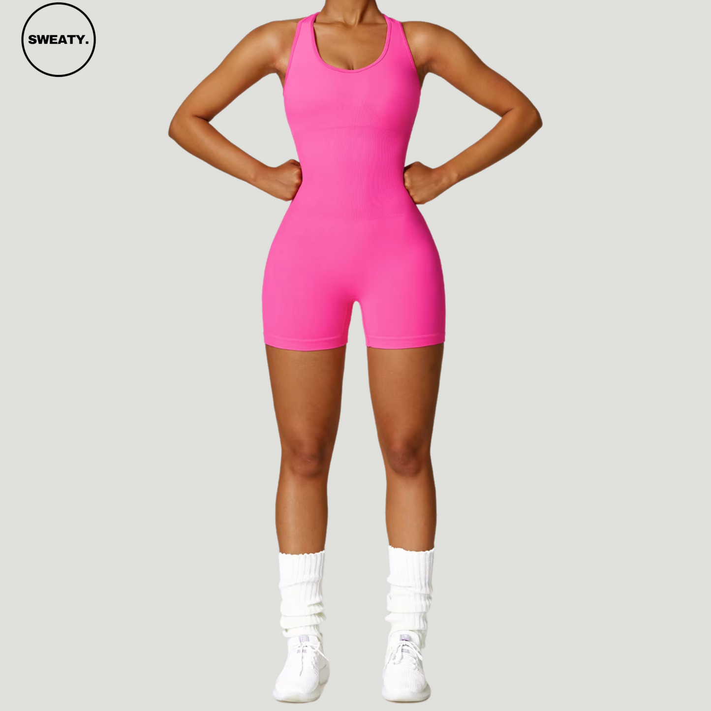 Hot pink seamless gym shortie jumpsuit by SWEATY - Women's full-body view showcasing a vibrant, figure-hugging design. This jumpsuit is ideal for gym workouts, offering a seamless, breathable, and flexible fit for optimal performance and style.