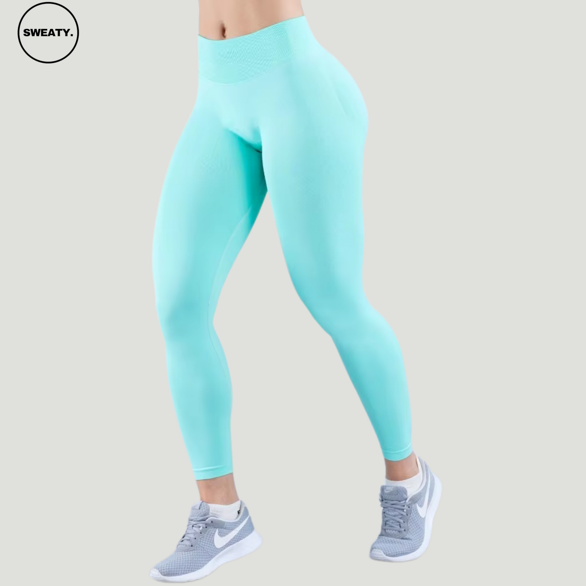 SWEATY Ice Mint High Waist Scrunch Butt Yoga Leggings, side angle view showcasing the seamless fit and vibrant ice mint shade.