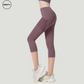 SWEATY Light Purple High Waist Capri Pants with Mesh Pockets. These capri-length yoga pants feature breathable mesh details and a flattering high-waisted design, ideal for workouts and active wear.