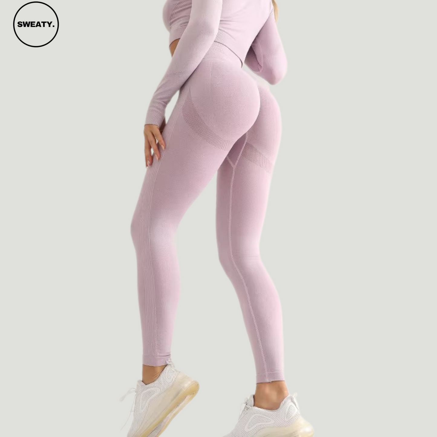 Back view of light purple seamless high-waist leggings by SWEATY, highlighting the form-fitting and supportive design ideal for workouts and casual wear.