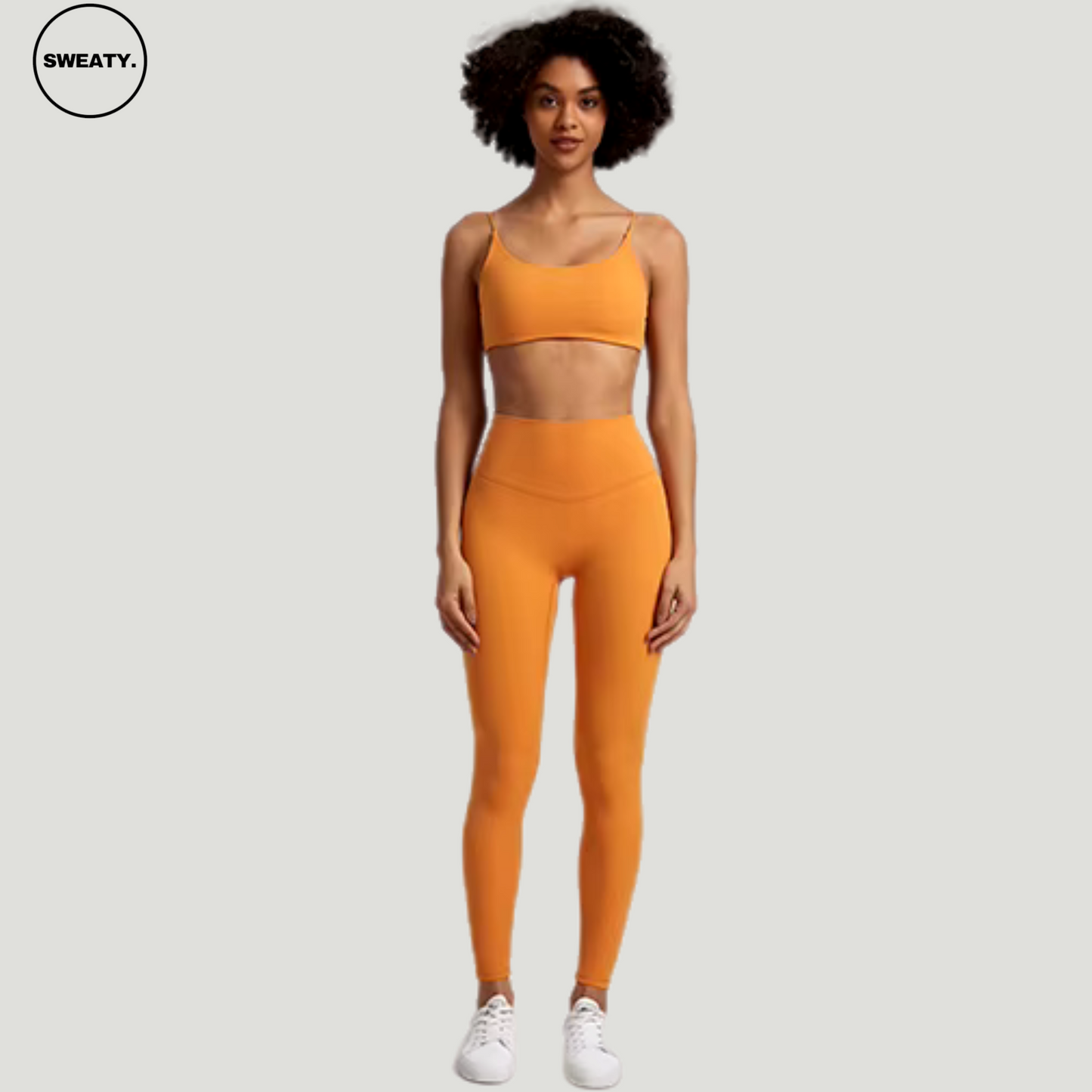 Mulberry Orange Buttery Soft Gym Set by SWEATY - Women's bold and vibrant mulberry orange leggings and sports bra, featuring an elegant cross-back design for enhanced support and style during fitness activities. Perfect for those looking to stand out in the gym with both color and performance.