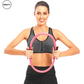 Front view of woman using pink exercise ring by SWEATY for upper body workout. Pilates and strength training tool designed for toning and resistance exercises. Comfortable foam handles for easy grip during fitness routines.