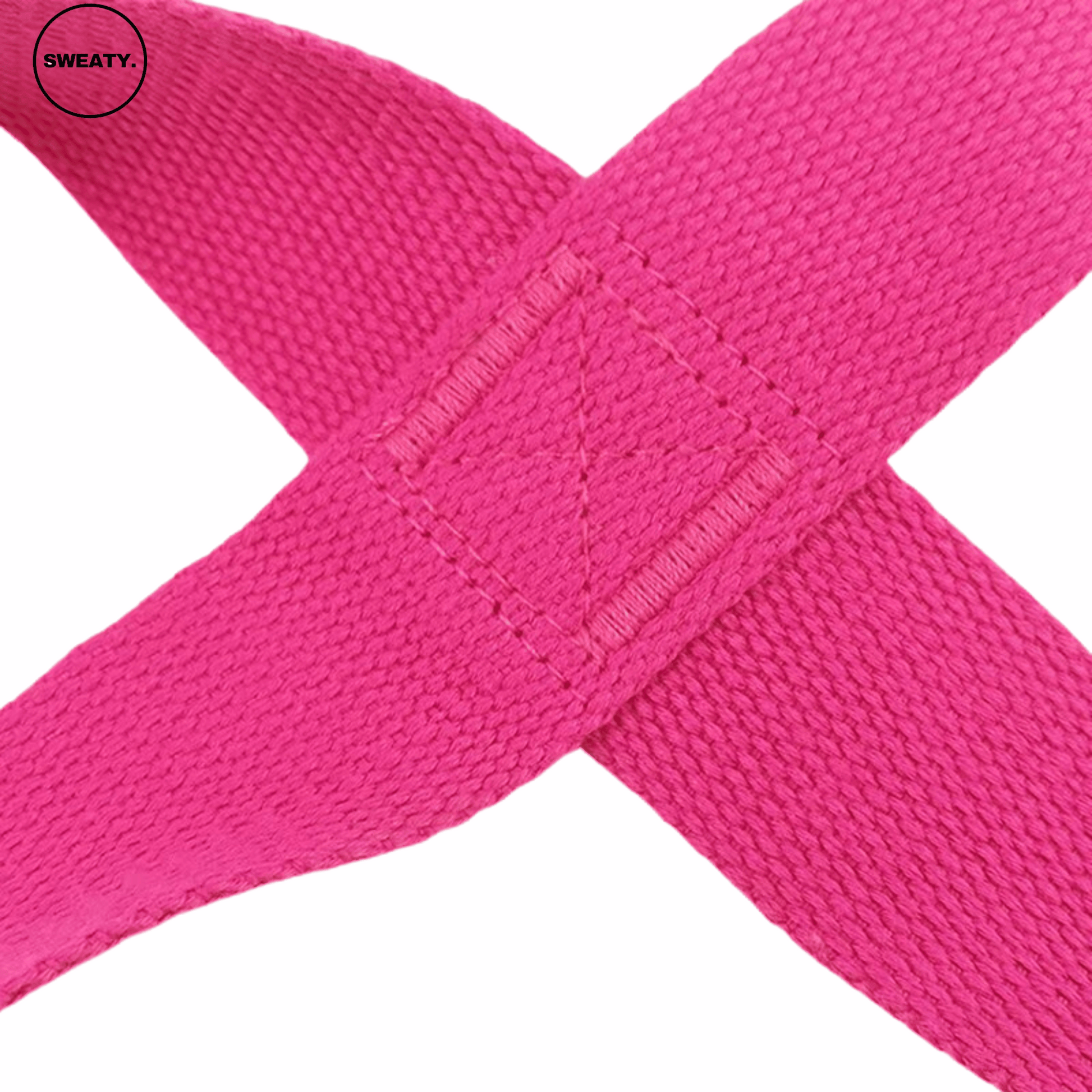 Close-up view of pink yoga resistance band by SWEATY, showing detailed stitching and fabric texture. High-quality elastic band designed for flexibility exercises and resistance training.