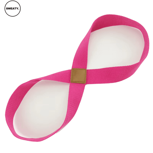 Front view of pink yoga resistance band by SWEATY - a durable and flexible fitness accessory for stretching and resistance training. Made of high-quality elastic fabric for comfort and performance during workouts.