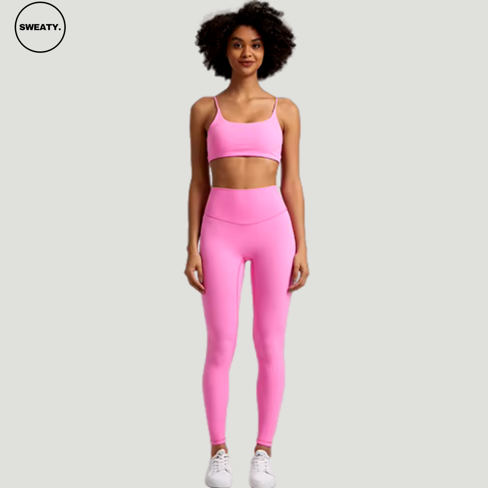 Powder Pink Buttery Soft Gym Set by SWEATY - Women's gym set in delicate powder pink, offering a smooth, close-fitting sports bra and high-waisted leggings designed for optimal comfort and performance during fitness routines.