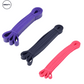 Set of three fitness resistance bands in purple, black, and pink colors, displayed from a top angle. Durable and versatile, perfect for strength training, flexibility, and resistance exercises. Ideal for home and gym workouts. SWEATY fitness equipment for effective exercise routines.