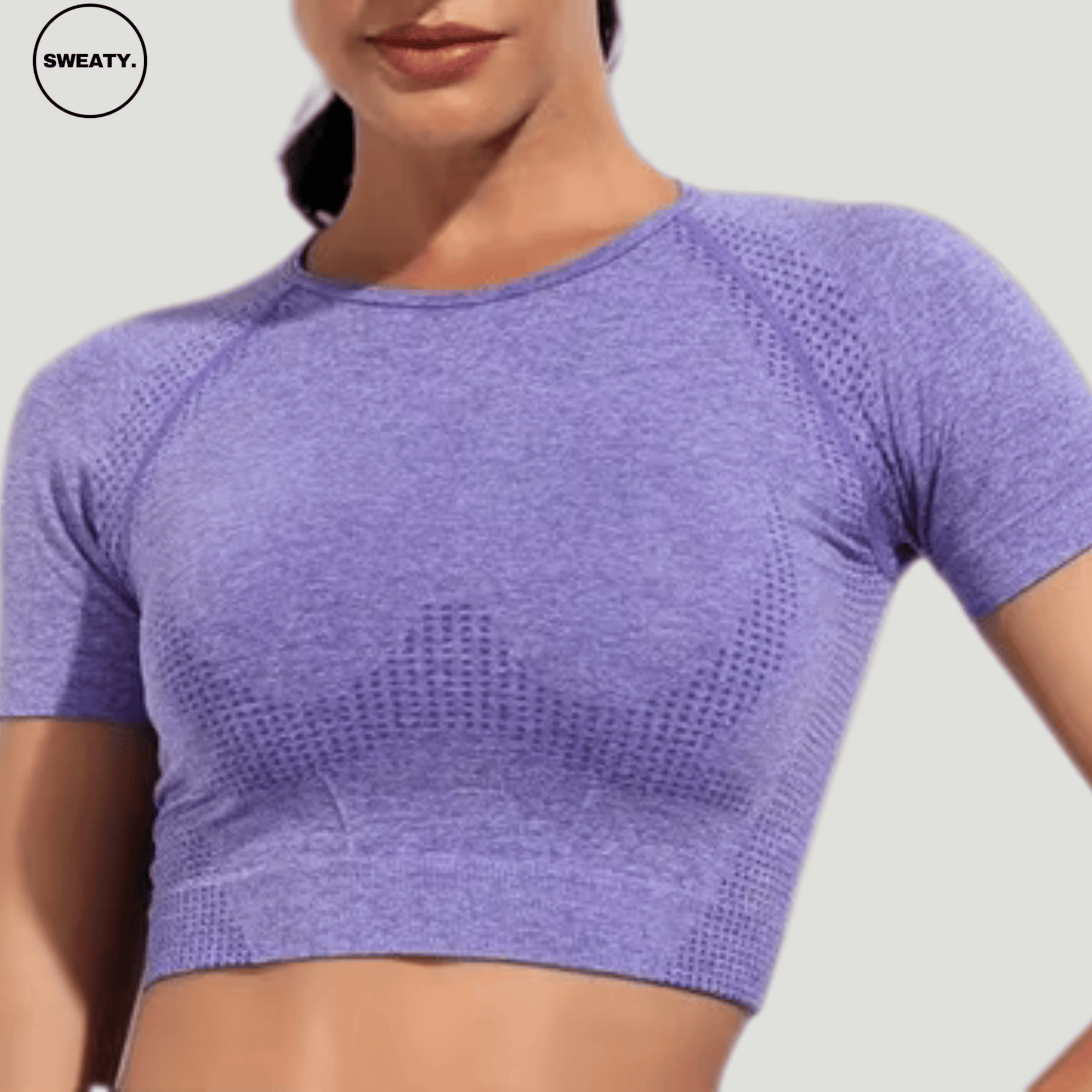 Purple Seamless Quick Dry Yoga Crop Top by SWEATY - Women's breathable and moisture-wicking crop top ideal for yoga and fitness. Designed with a sleek, supportive fit and short sleeves for optimal comfort during workouts.