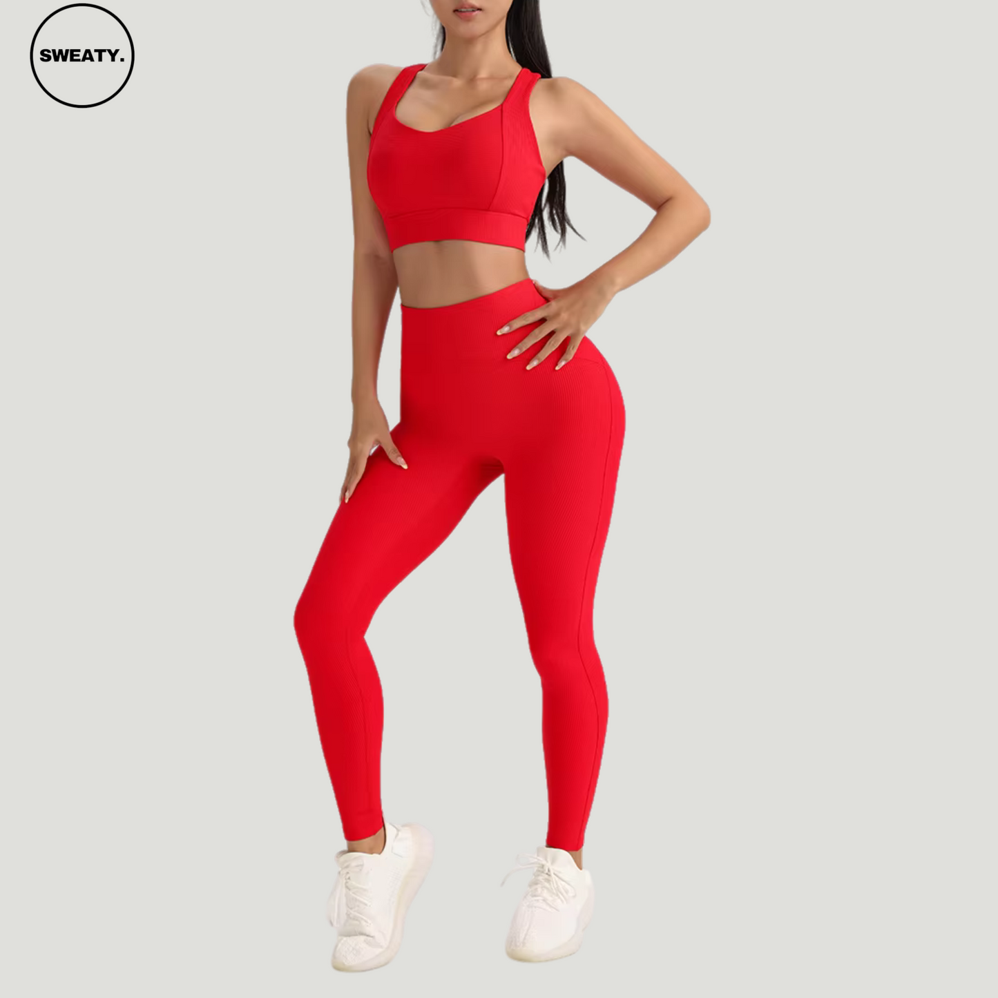 Red-Cross-Yoga-Suit-Front-Side-View-by-SWEATY - Women's bold and vibrant Red Yoga Suit, featuring an elegant cross-back design for enhanced support and style during fitness activities. Perfect for those looking to stand out in the gym with both color and performance.