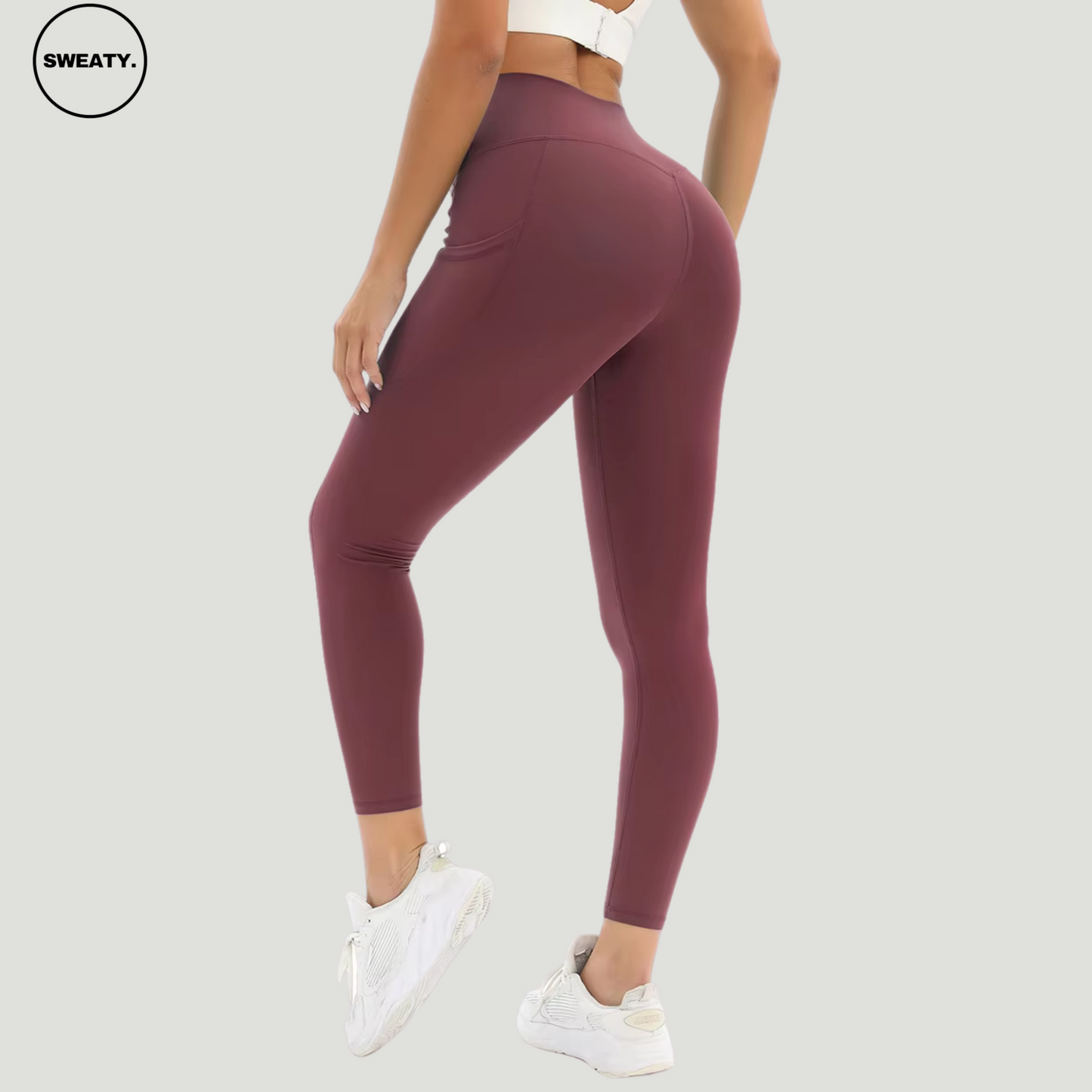 Red Merlot Tummy Control Yoga Pants by SWEATY - Back view showcasing high-rise waist and sleek fit. Designed for yoga, running, and fitness. Women's activewear made from breathable, moisture-wicking fabric for optimal comfort and performance.