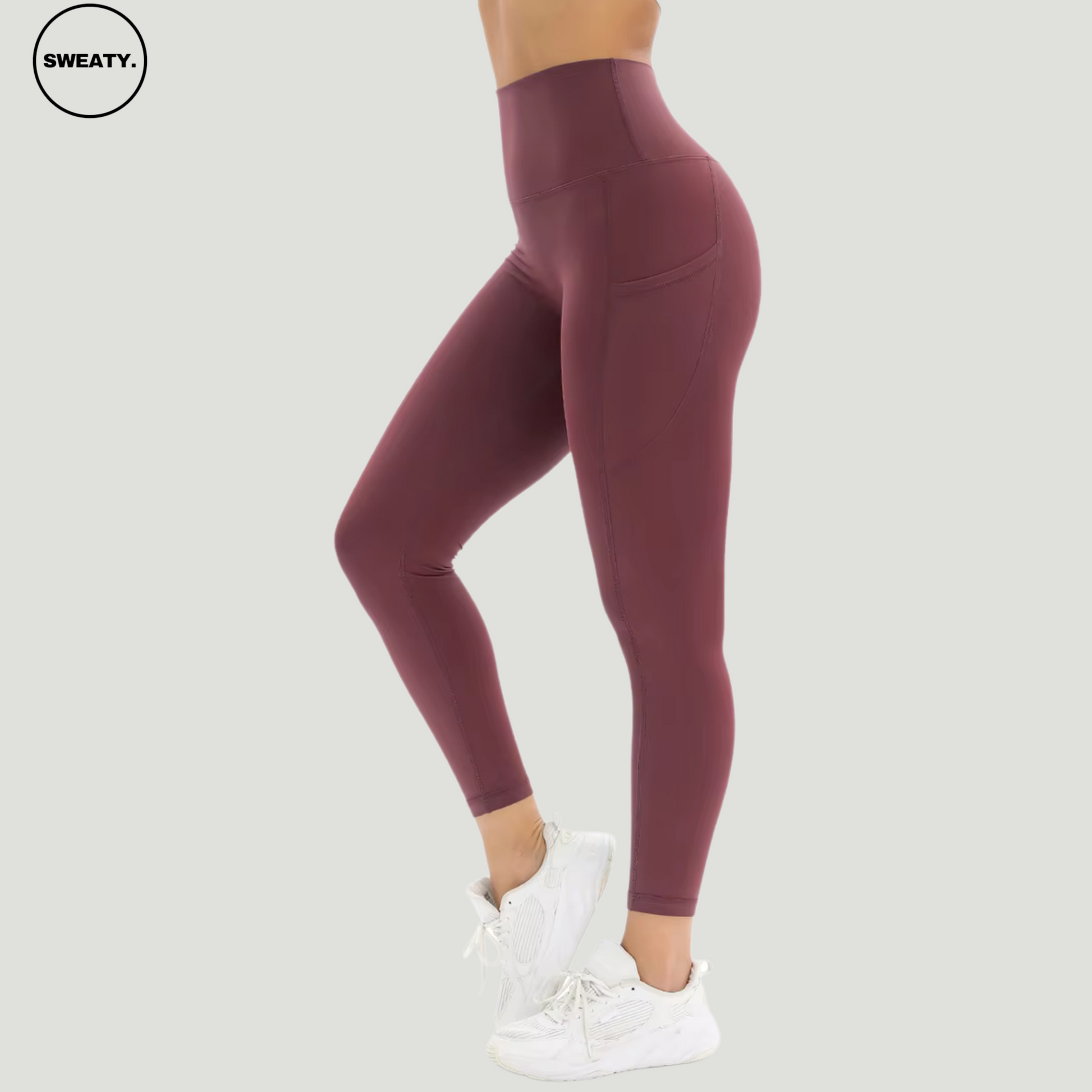 Red Merlot Tummy Control Yoga Pants by SWEATY - Side view showing high-rise waist and sleek side pocket design. Made from moisture-wicking, breathable fabric perfect for yoga, running, and gym workouts. These leggings offer tummy control and a comfortable, body-hugging fit for enhanced performance.