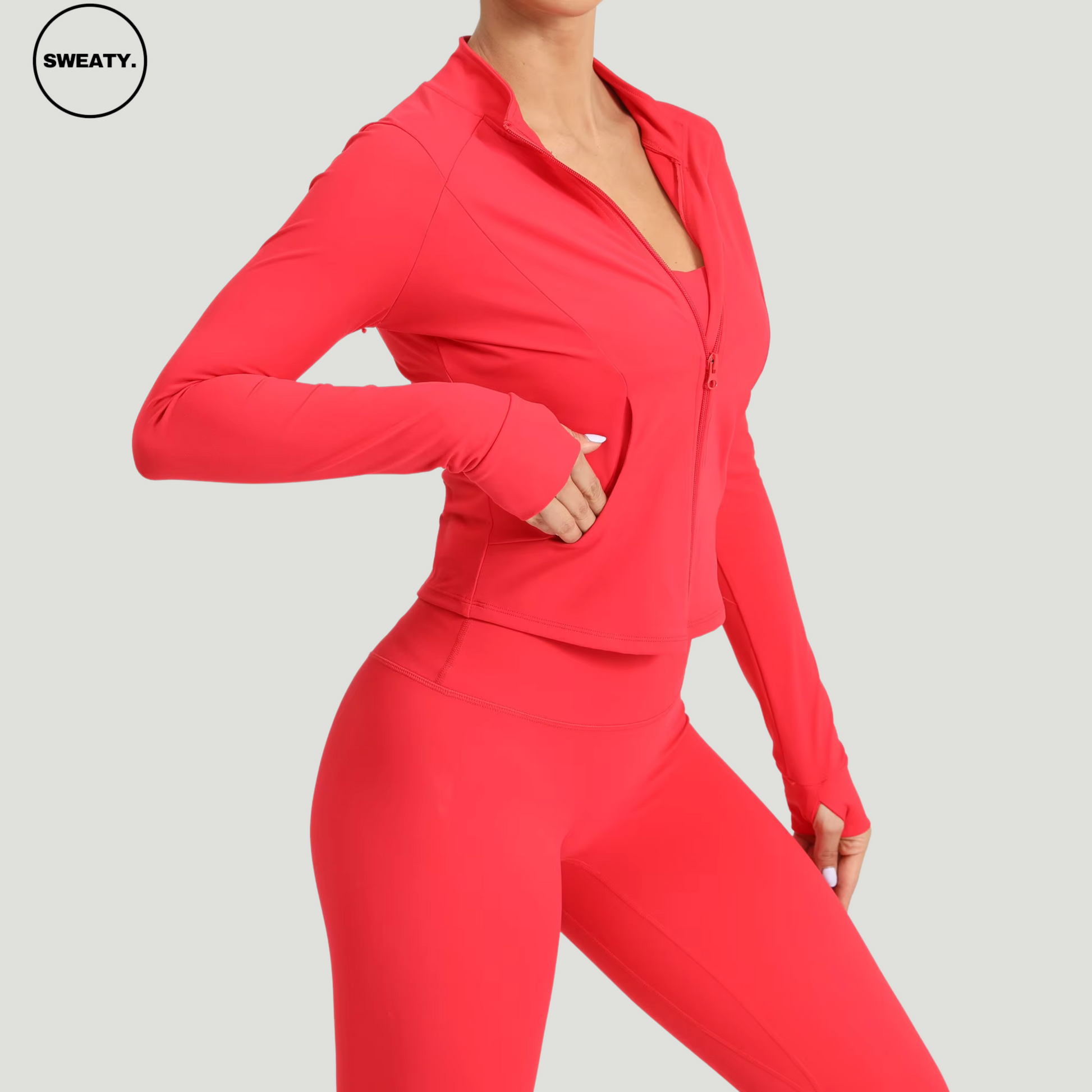 ide view of Red Three Piece Workout Set by SWEATY - Sleek, comfortable, and stretchy workout set designed for fitness, featuring moisture-wicking fabric for breathability and quick drying during high-intensity activities.