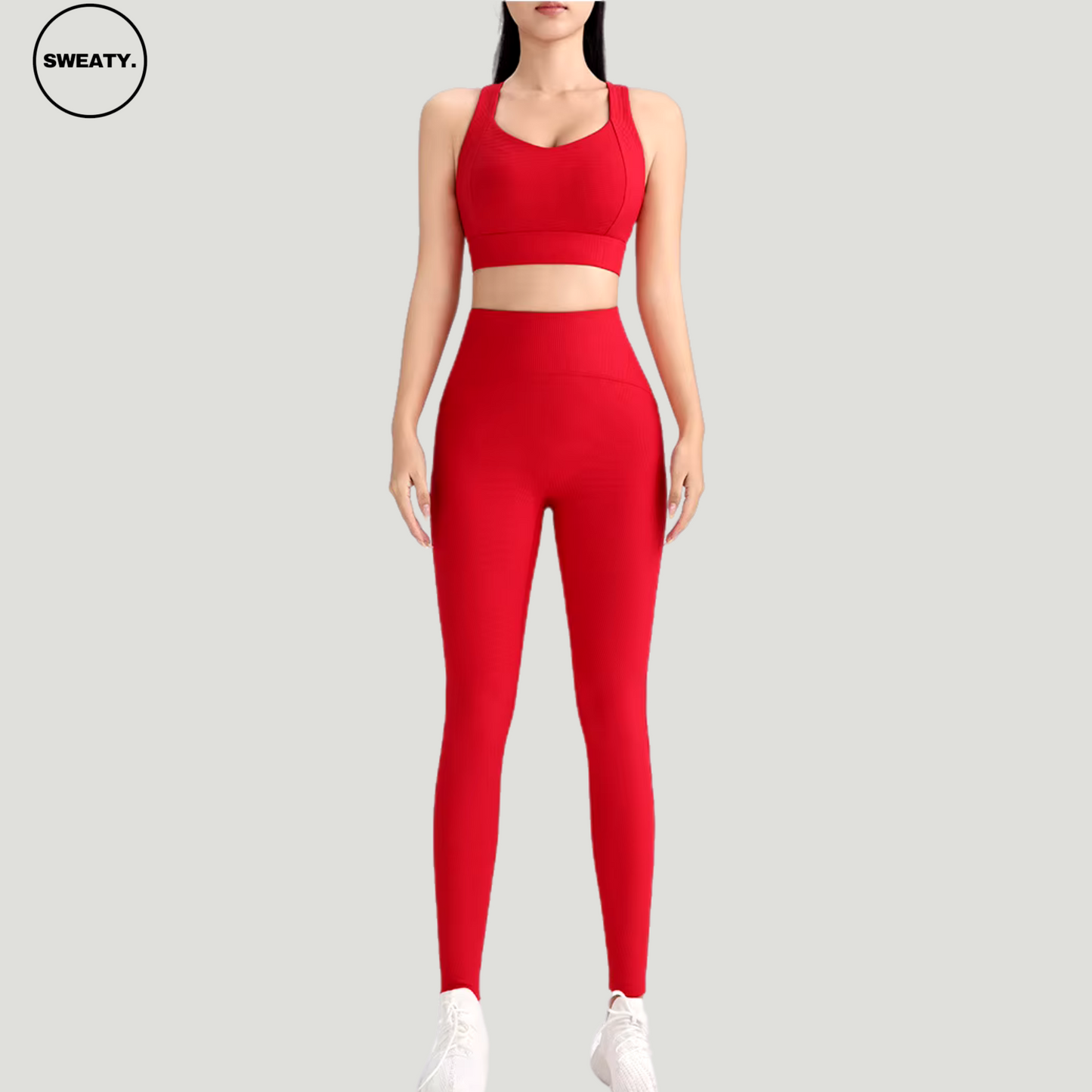 Red -Cross-Yoga-Suit-Front-View-by-SWEATY - Women's bold and vibrant Red Yoga Suit, featuring an elegant cross-back design for enhanced support and style during fitness activities. Perfect for those looking to stand out in the gym with both color and performance.