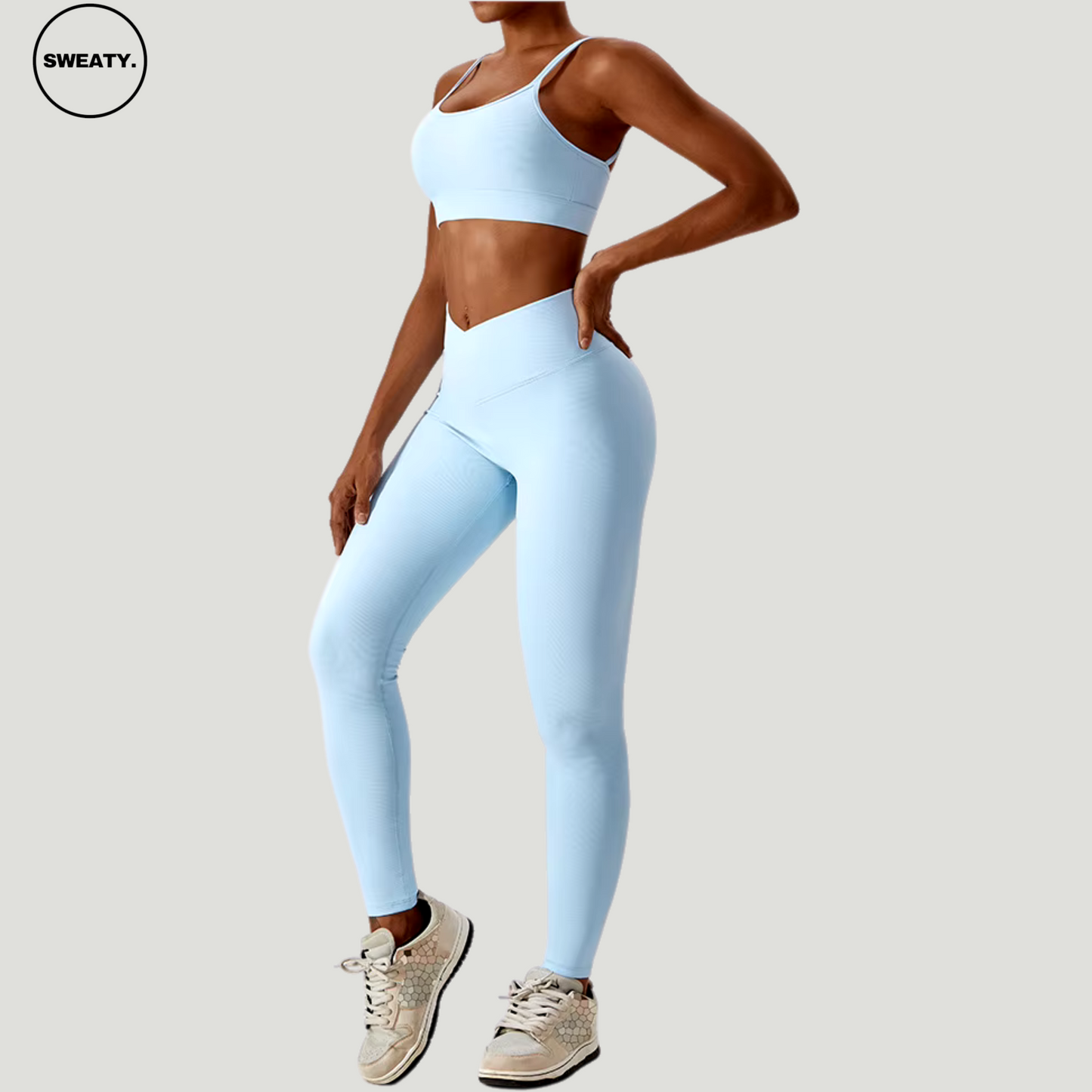 Sky Blue seamless sportswear set by SWEATY – front view of high-waisted flare leggings and sports bra. Perfect for yoga and gym activities with its breathable, flexible, and quick-dry fabric.