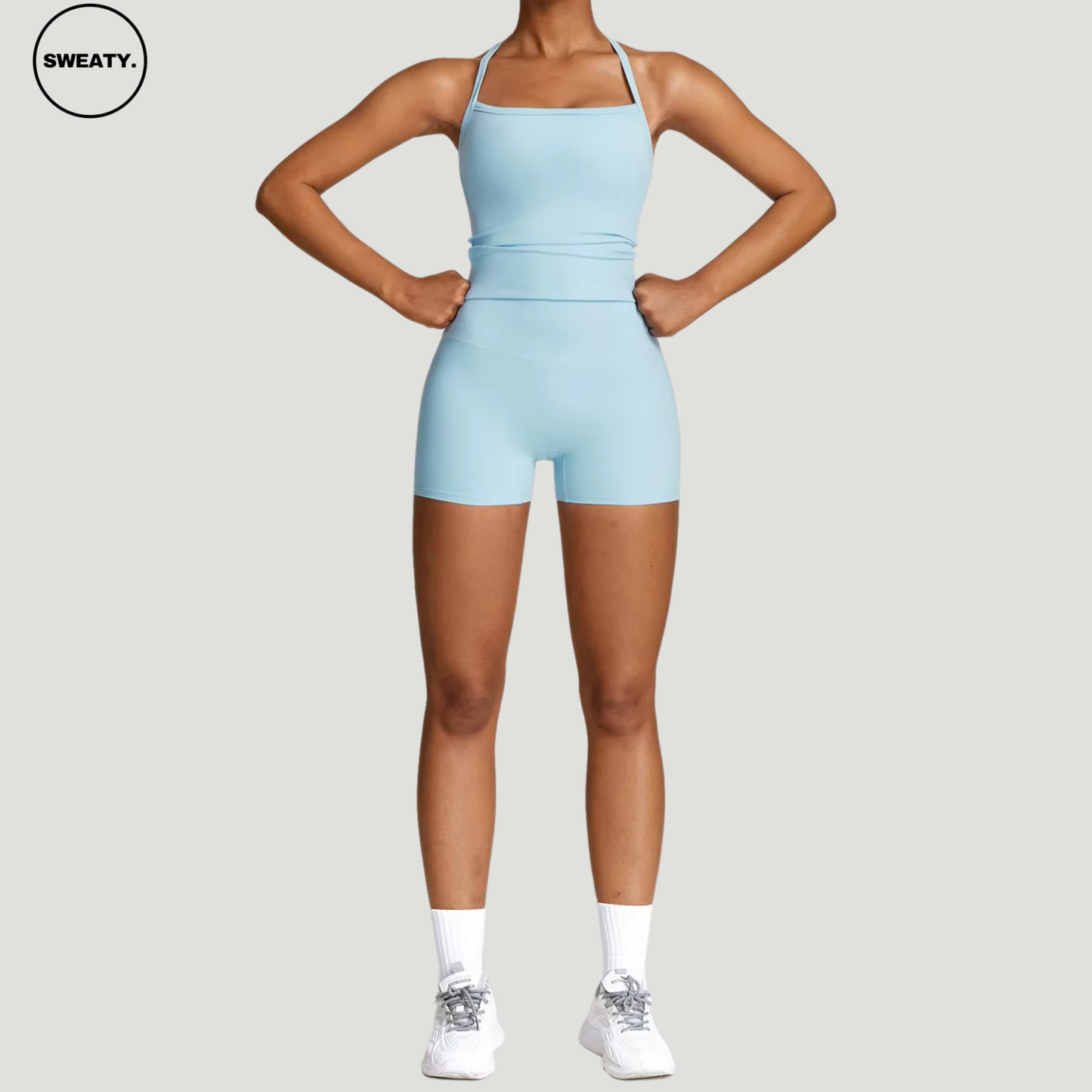 Sky Blue seamless yoga set by SWEATY – full-body view showcasing a breathable and moisture-wicking workout outfit perfect for yoga, gym, and fitness routines. Comfortable high-waisted shorts and supportive tank top