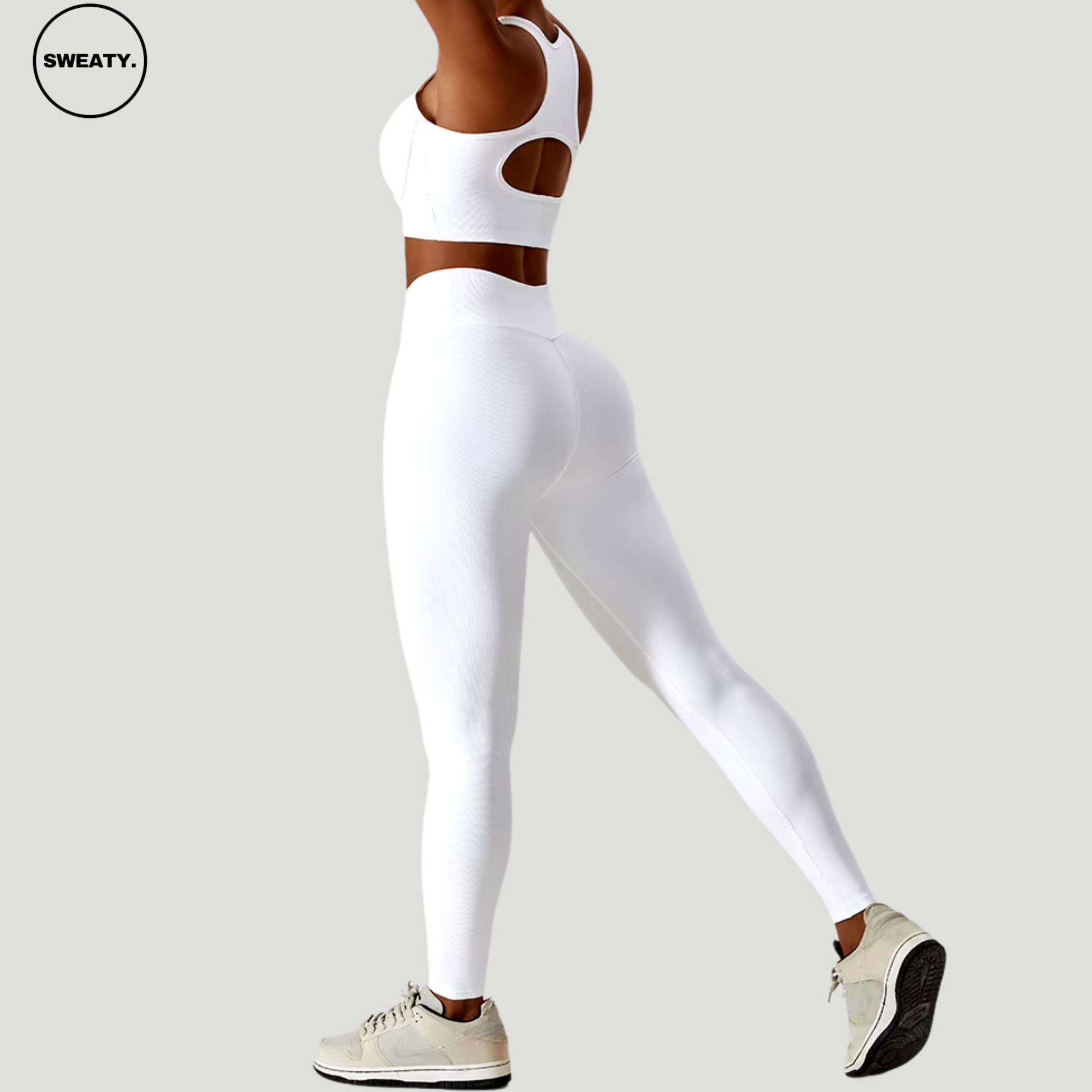 White High Quality Seamless Sportswear Set by SWEATY - Women's seamless activewear with moisture-wicking, breathable fabric. Designed for comfort during yoga, running, and fitness.