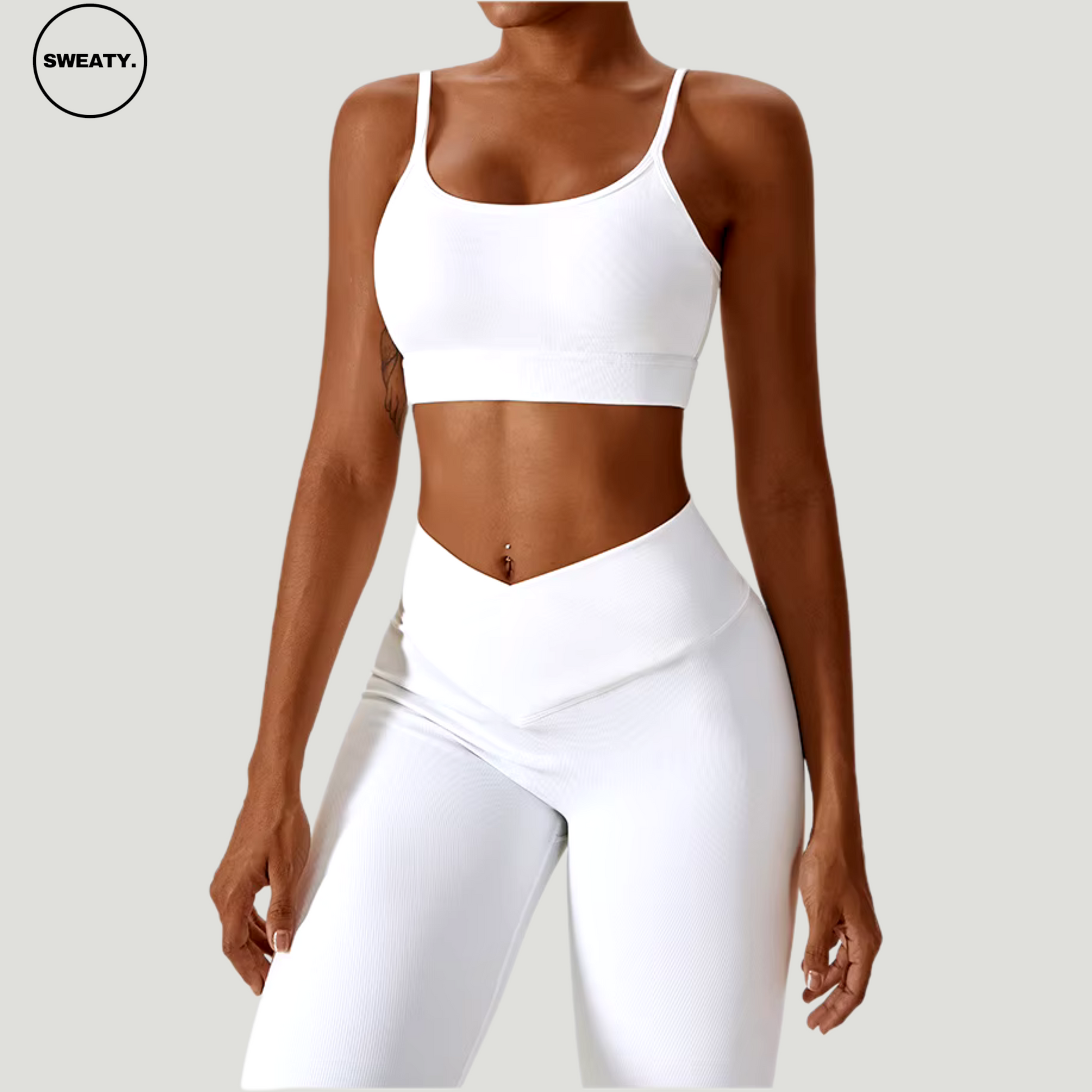 White seamless sportswear set by SWEATY – front view showcasing the spaghetti strap sports bra and high-waisted leggings. Ideal for workouts, yoga, and fitness, featuring quick-dry, flexible fabric for performance.