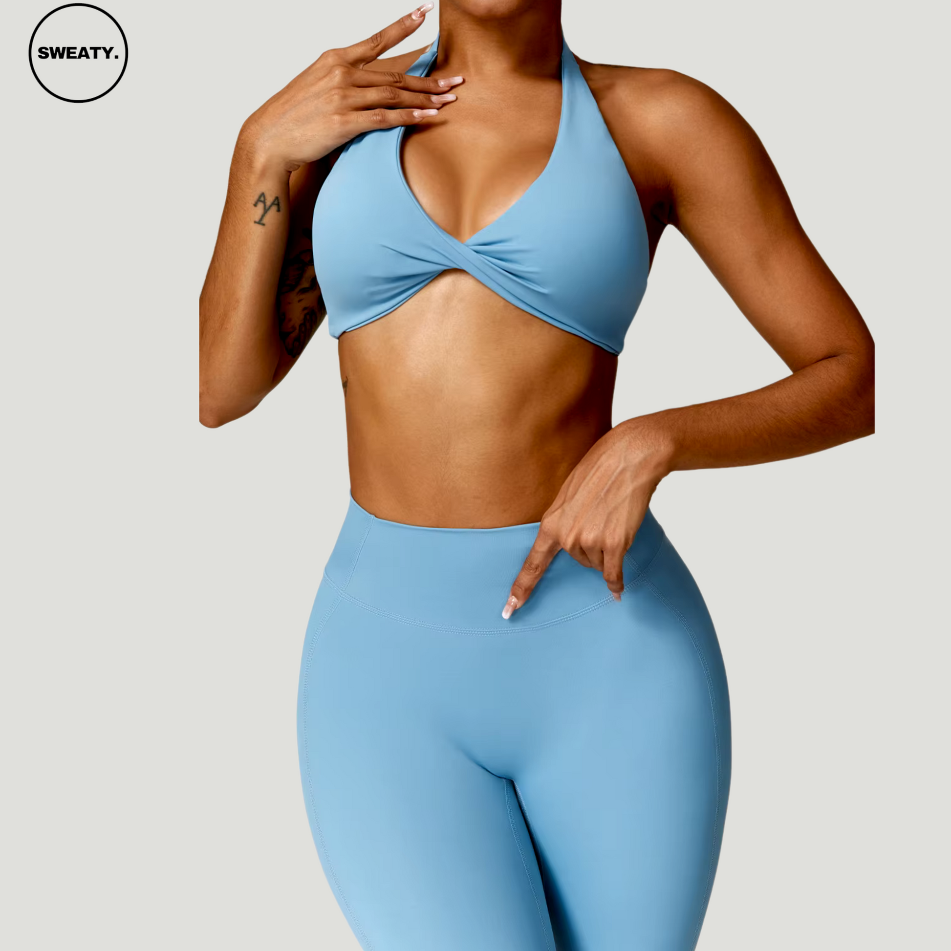 Blue Nude Feeling Yoga Set by SWEATY – Front view of women's halter-neck, seamless, and moisture-wicking activewear set. Lightweight, comfortable, and designed for yoga and fitness.